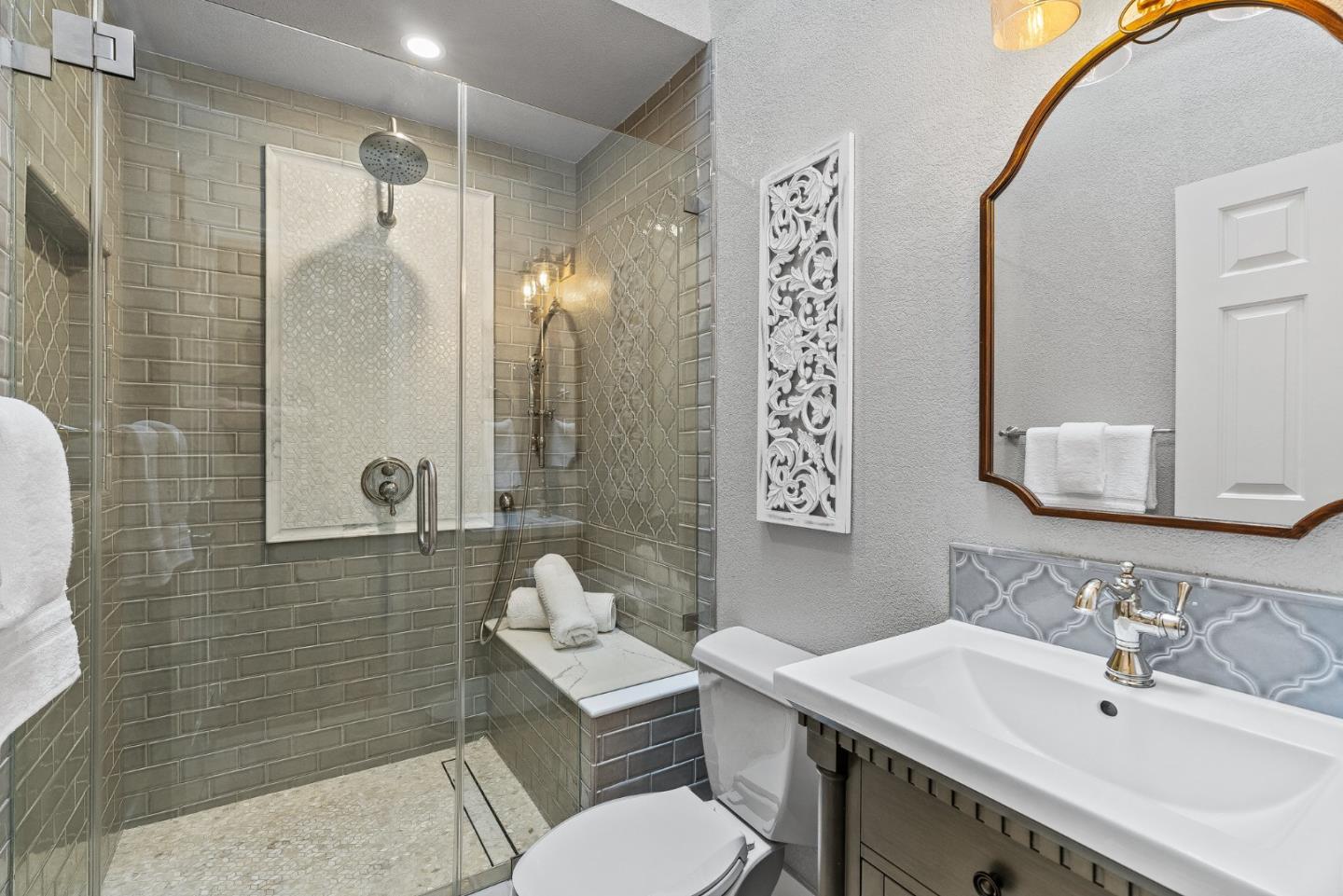 15650 Michael Lane Monte Sereno, CA 95030 - Photo 27 of 54 a bathroom with a sink toilet and shower