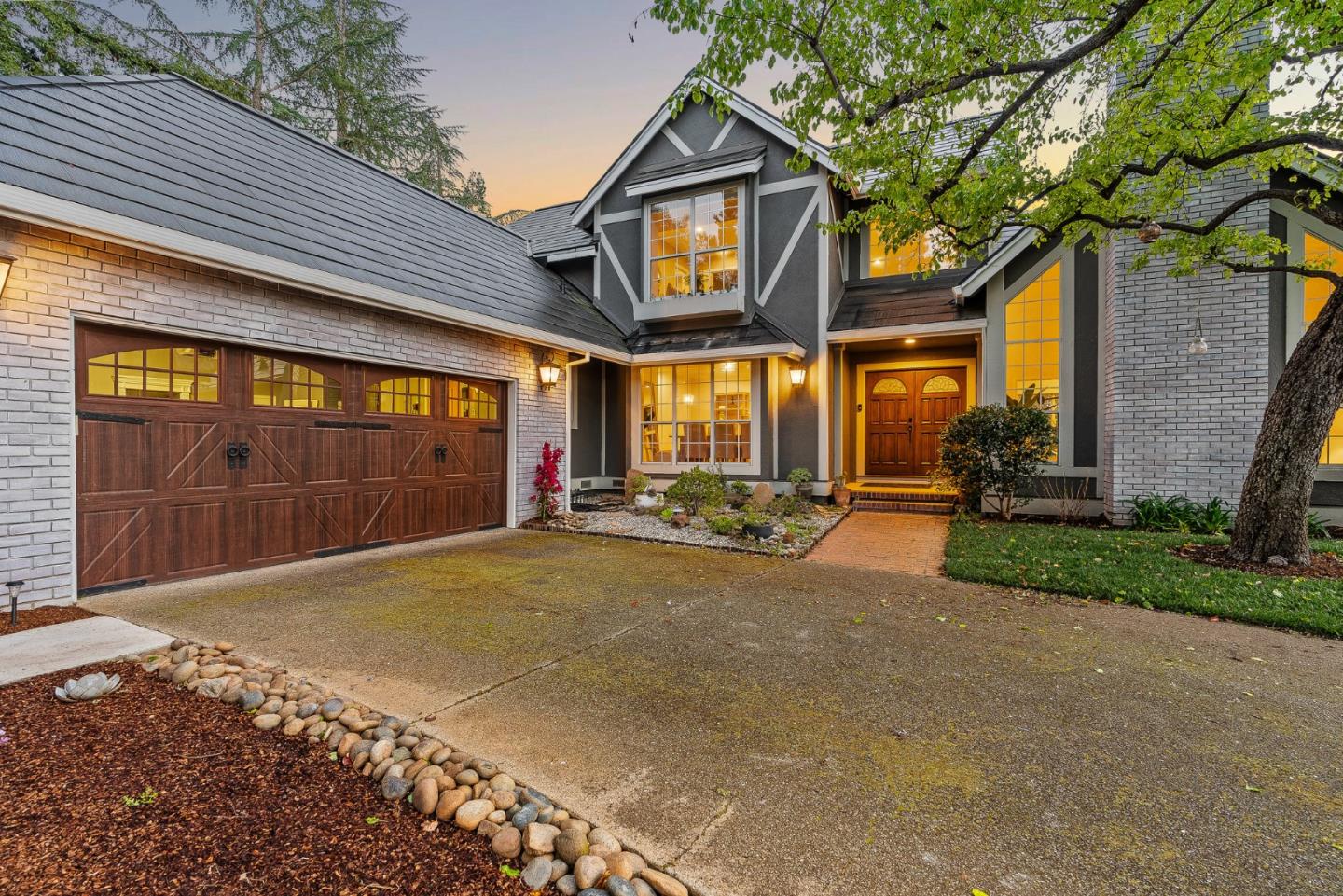 15650 Michael Lane Monte Sereno, CA 95030 - Photo 3 of 54 a view of a street with brick building in front of it