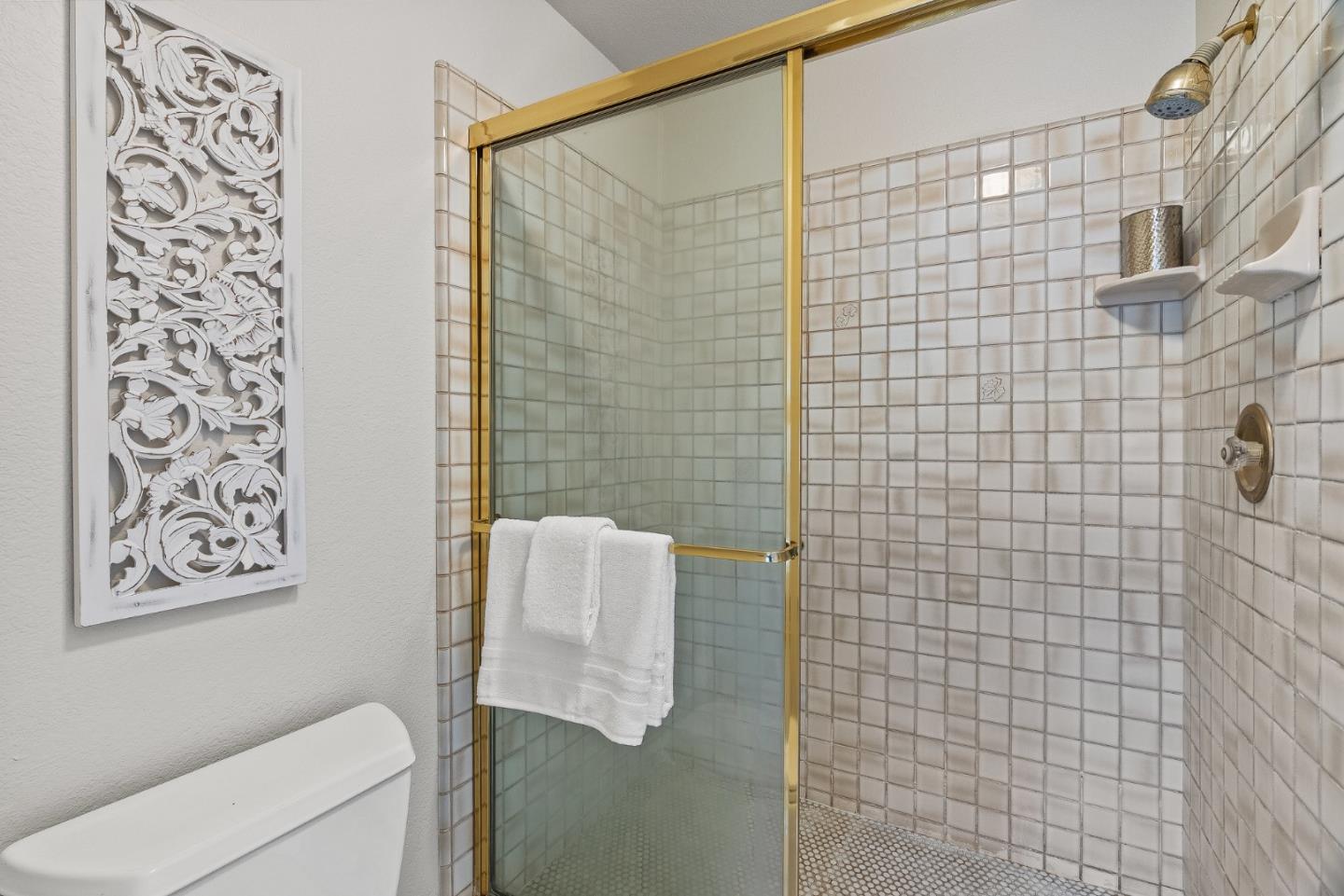 15650 Michael Lane Monte Sereno, CA 95030 - Photo 31 of 54 a bathroom with a shower and a sink