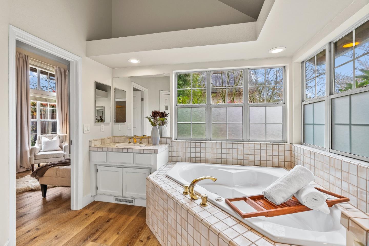 15650 Michael Lane Monte Sereno, CA 95030 - Photo 32 of 54 a living room with granite countertop furniture a rug and a window