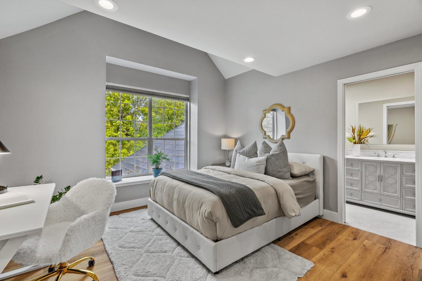 15650 Michael Lane Monte Sereno, CA 95030 - Photo 36 of 54 a bedroom with a large bed and a window