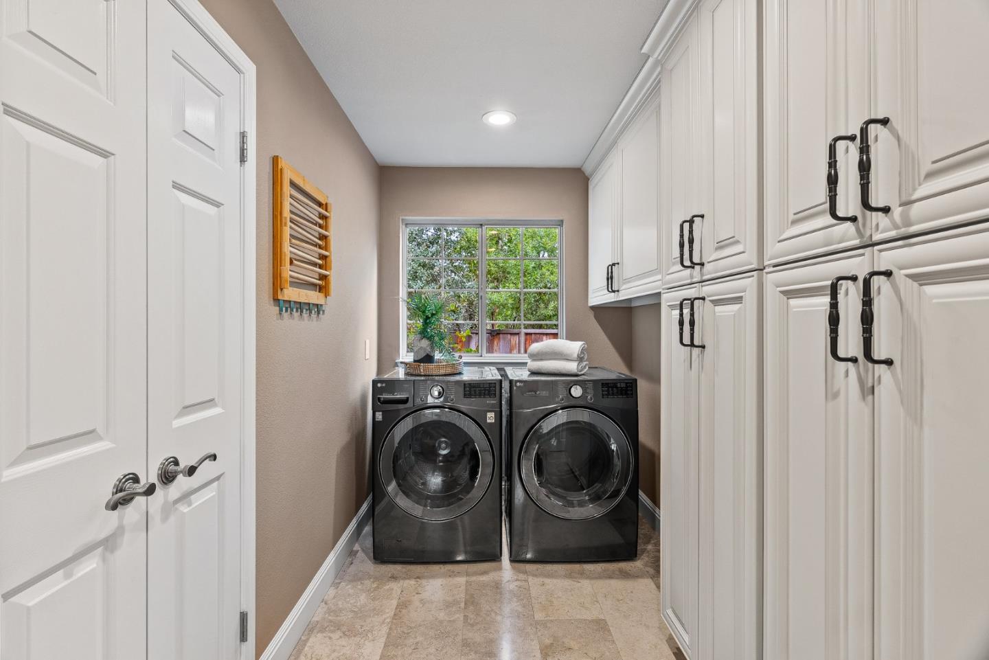 15650 Michael Lane Monte Sereno, CA 95030 - Photo 43 of 54 a utility room with sink dryer and washer
