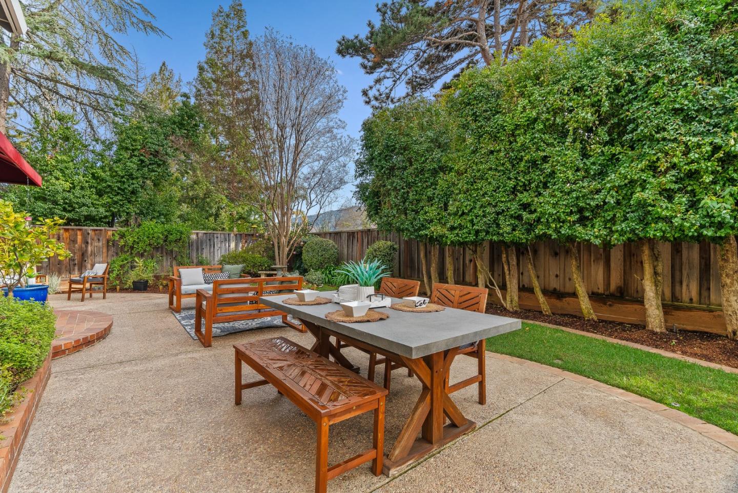 15650 Michael Lane Monte Sereno, CA 95030 - Photo 48 of 54 a backyard of a house with outdoor seating