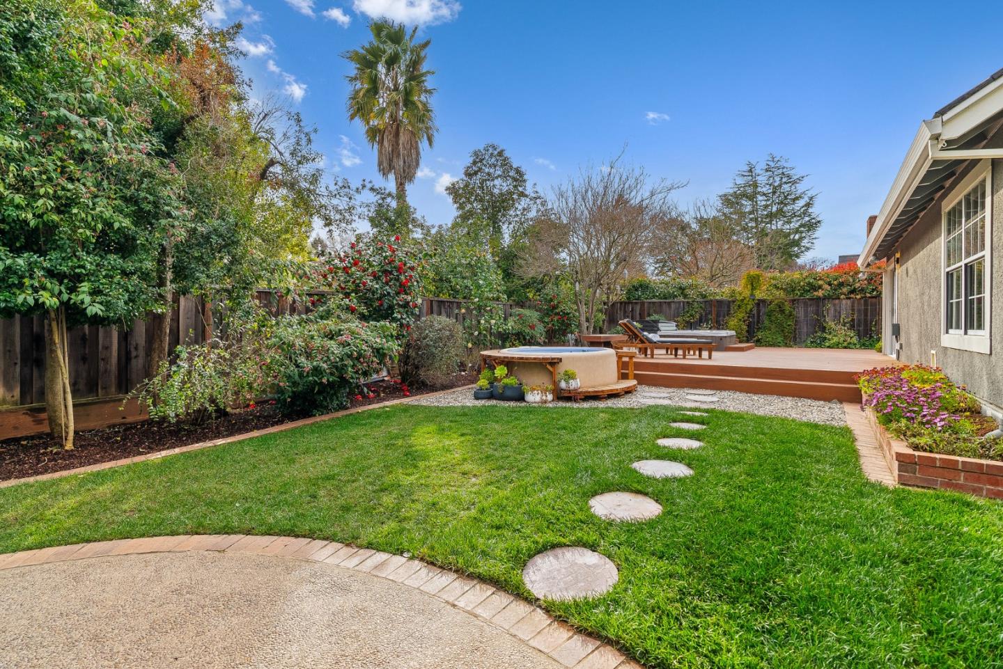 15650 Michael Lane Monte Sereno, CA 95030 - Photo 49 of 54 a backyard of a house with lots of green space