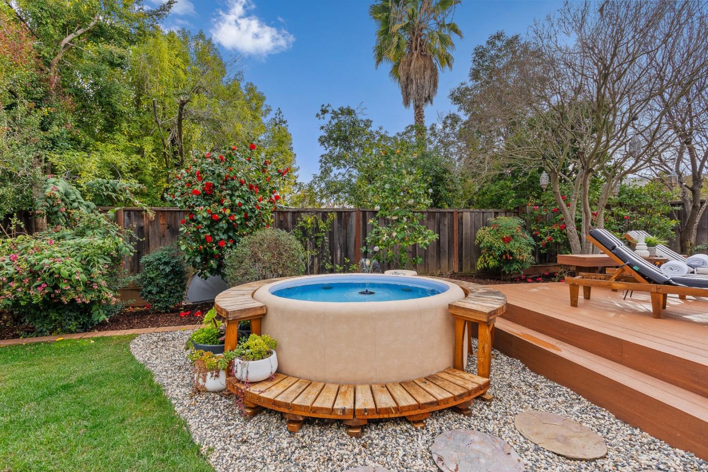 15650 Michael Lane Monte Sereno, CA 95030 - Photo 50 of 54 a view of a house with backyard sitting area and swimming pool