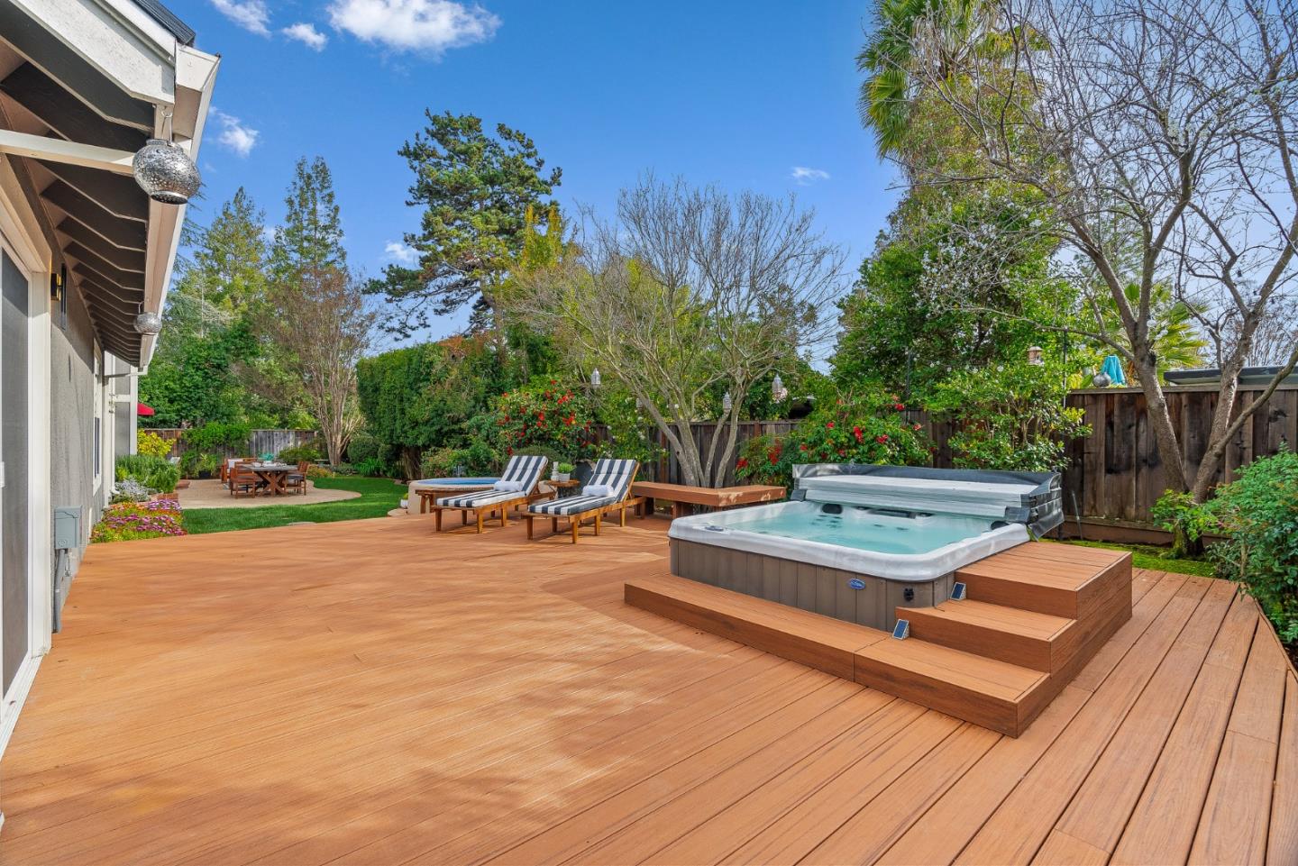15650 Michael Lane Monte Sereno, CA 95030 - Photo 53 of 54 a backyard of a house with table and chairs