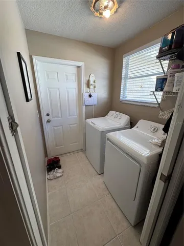 a room with dryer and washer