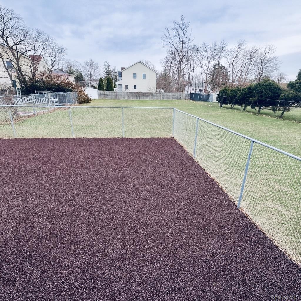 1243 Pea Pond Road North Bellmore, NY 11710 - Photo 3 of 16 a view of outdoor space yard and lake view