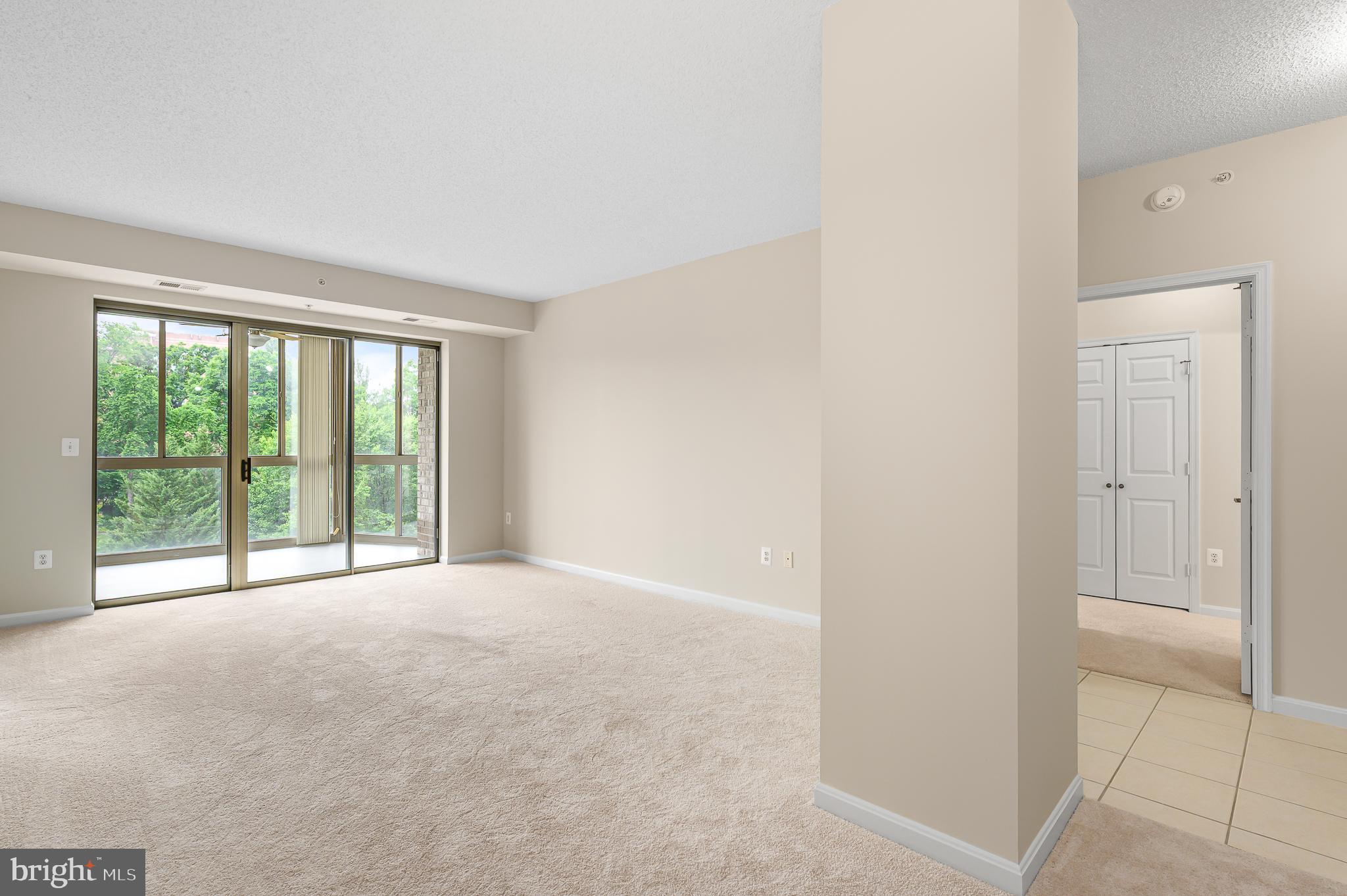 19355 Cypress Ridge Terrace, Unit 404 Leesburg, VA 20176 - Photo 12 of 39 a view of an empty room with a window