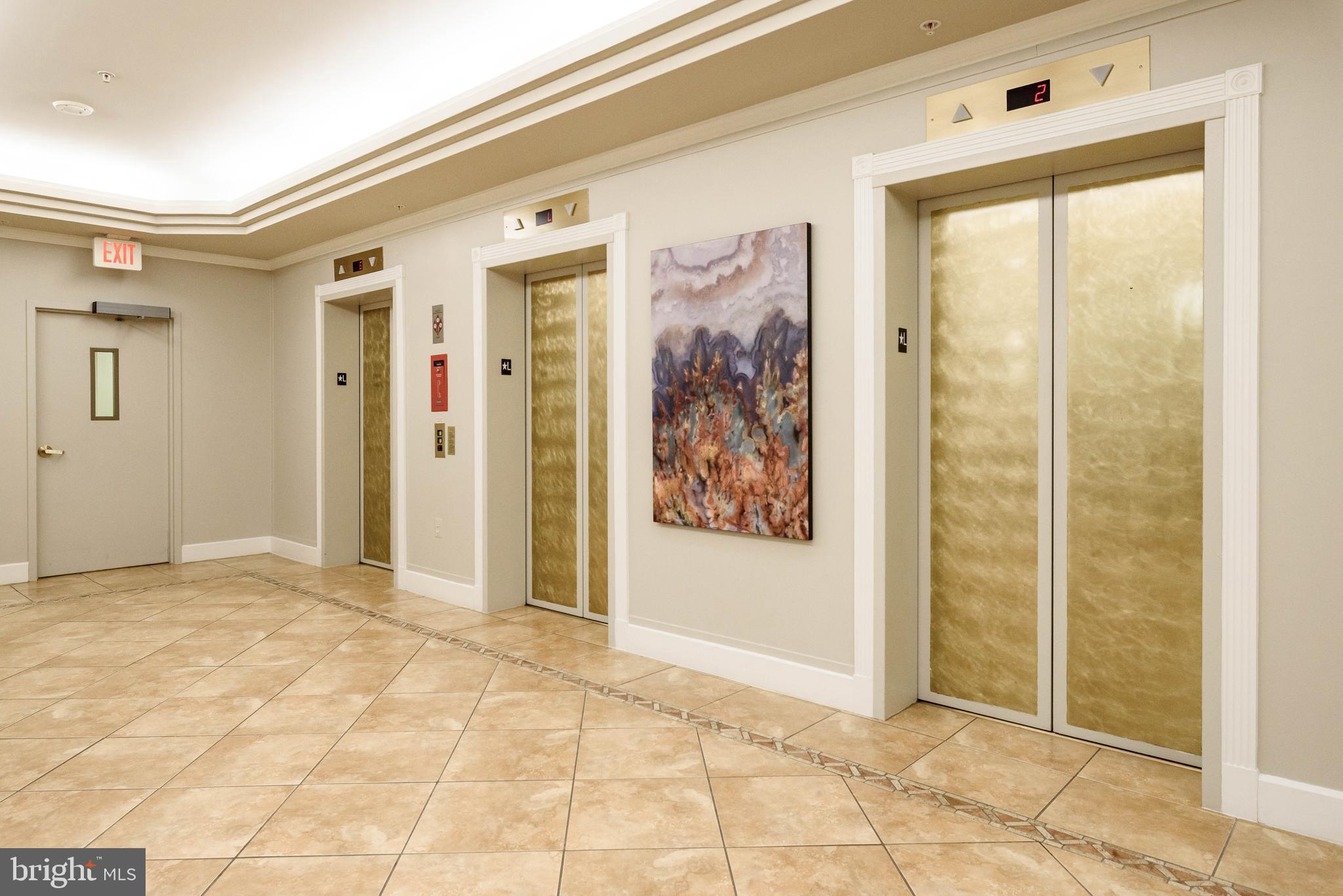 19355 Cypress Ridge Terrace, Unit 404 Leesburg, VA 20176 - Photo 24 of 39 a view of a big room with window and bathroom