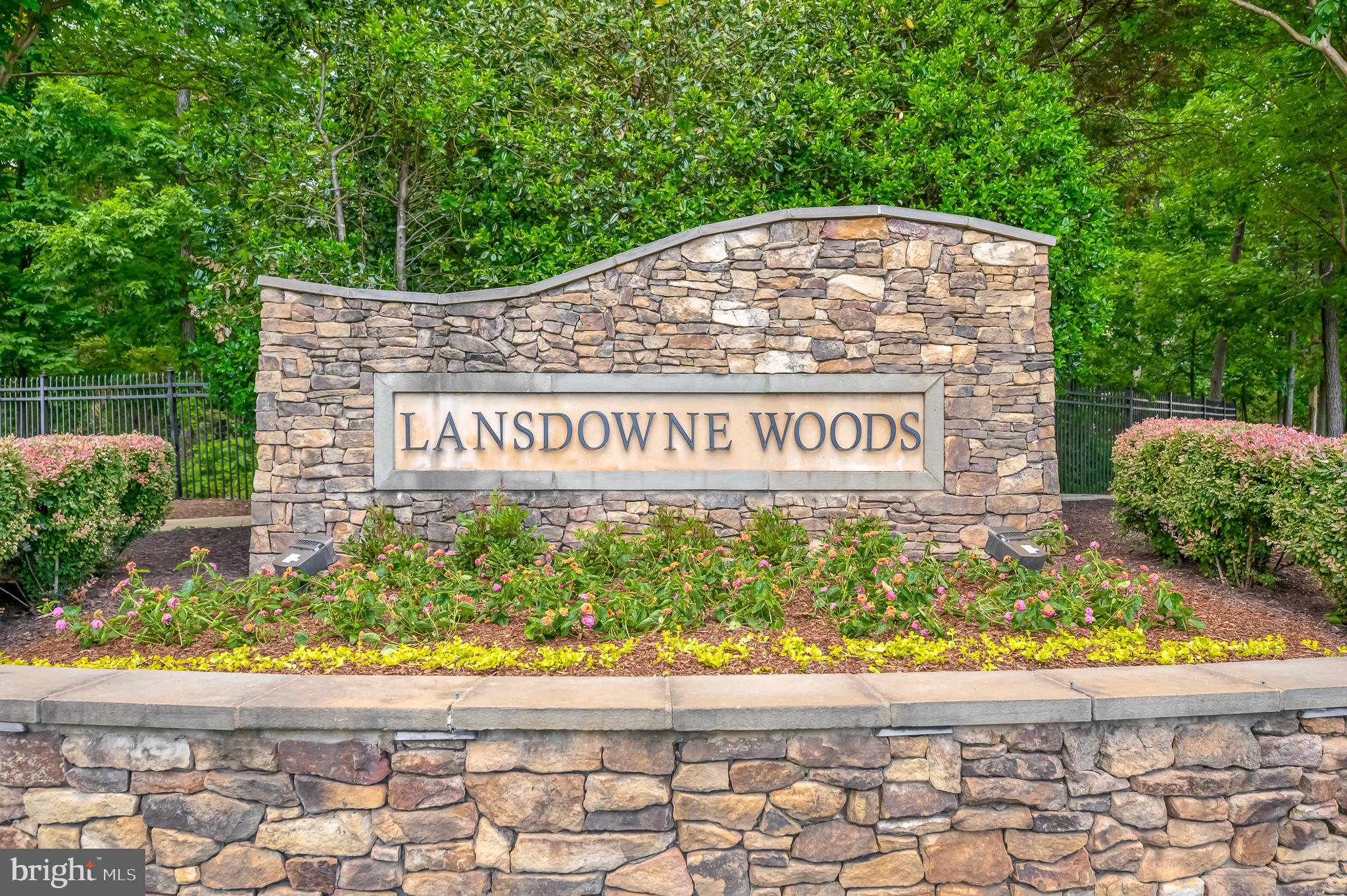 19355 Cypress Ridge Terrace, Unit 404 Leesburg, VA 20176 - Photo 27 of 39 a sign on the side of a building