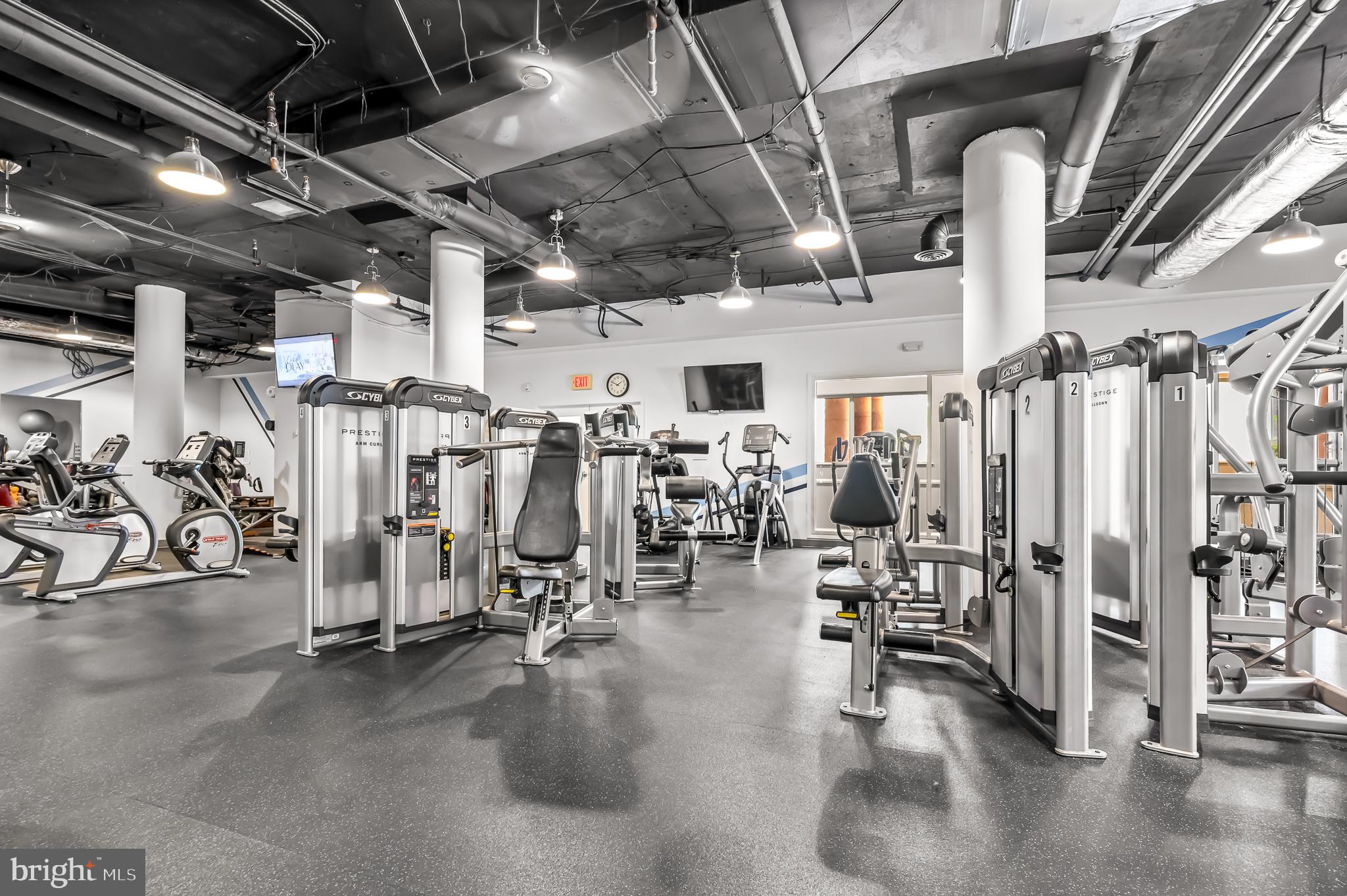 19355 Cypress Ridge Terrace, Unit 404 Leesburg, VA 20176 - Photo 31 of 39 a view of a room with gym equipment