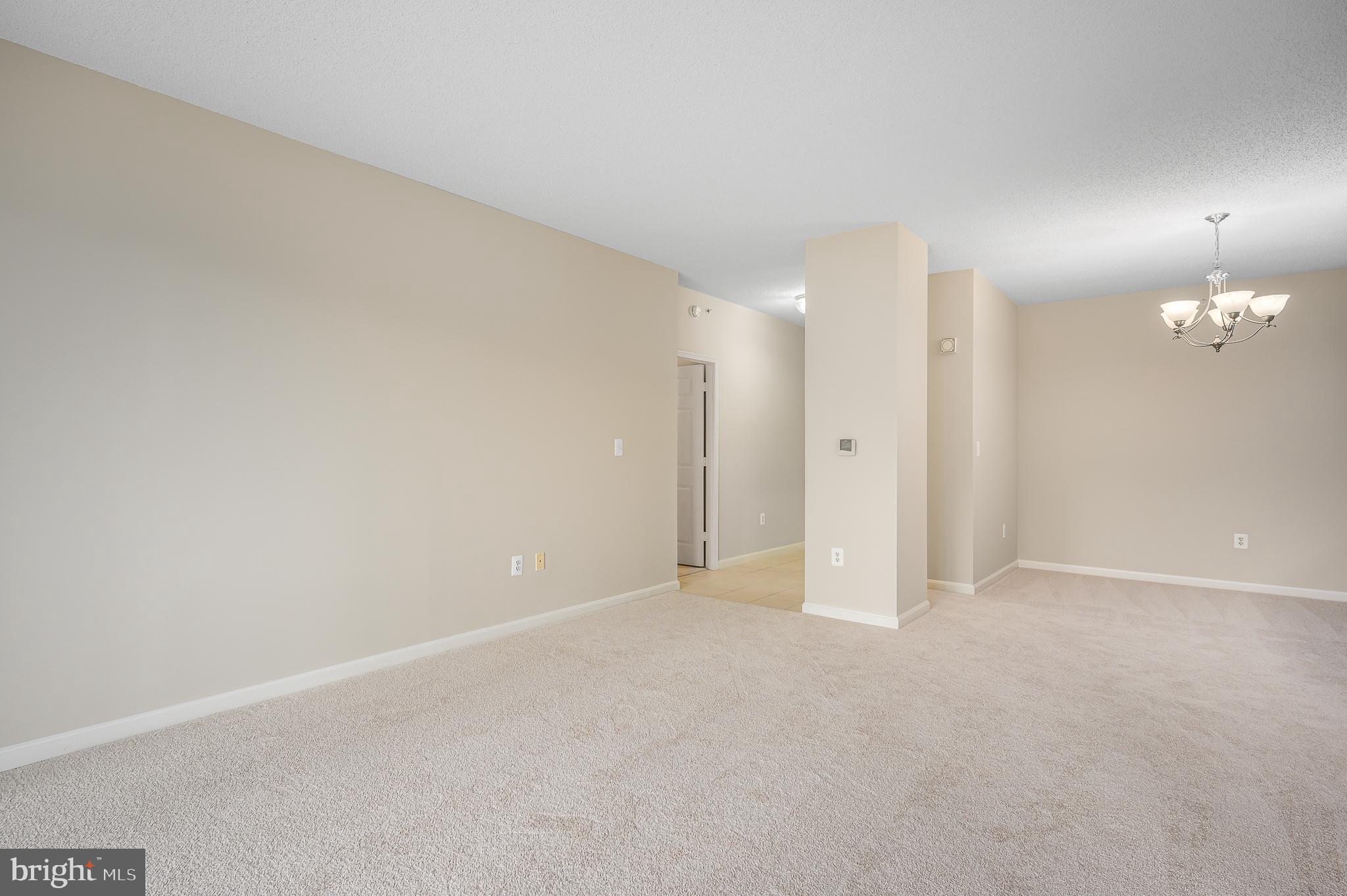 19355 Cypress Ridge Terrace, Unit 404 Leesburg, VA 20176 - Photo 5 of 39 a view of an empty room