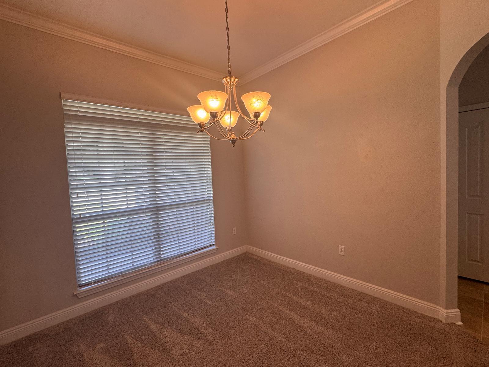 744 Lime Lane Crestview, FL 32536 - Photo 13 of 25 a view of an empty room with a window