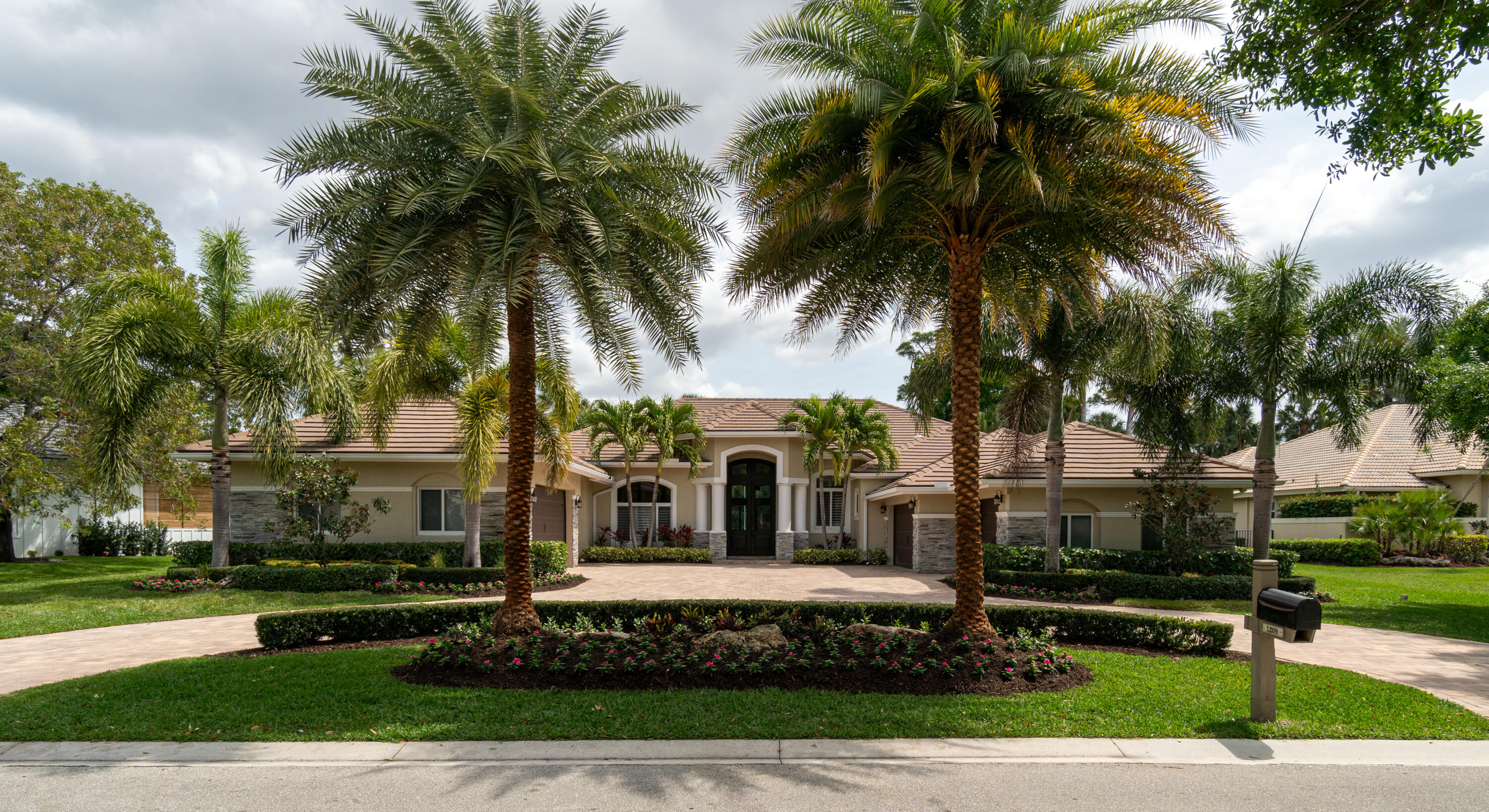 1209 Breakers W Boulevard West Palm Beach, FL 33411 - Photo 13 of 73 a view of a house with a yard