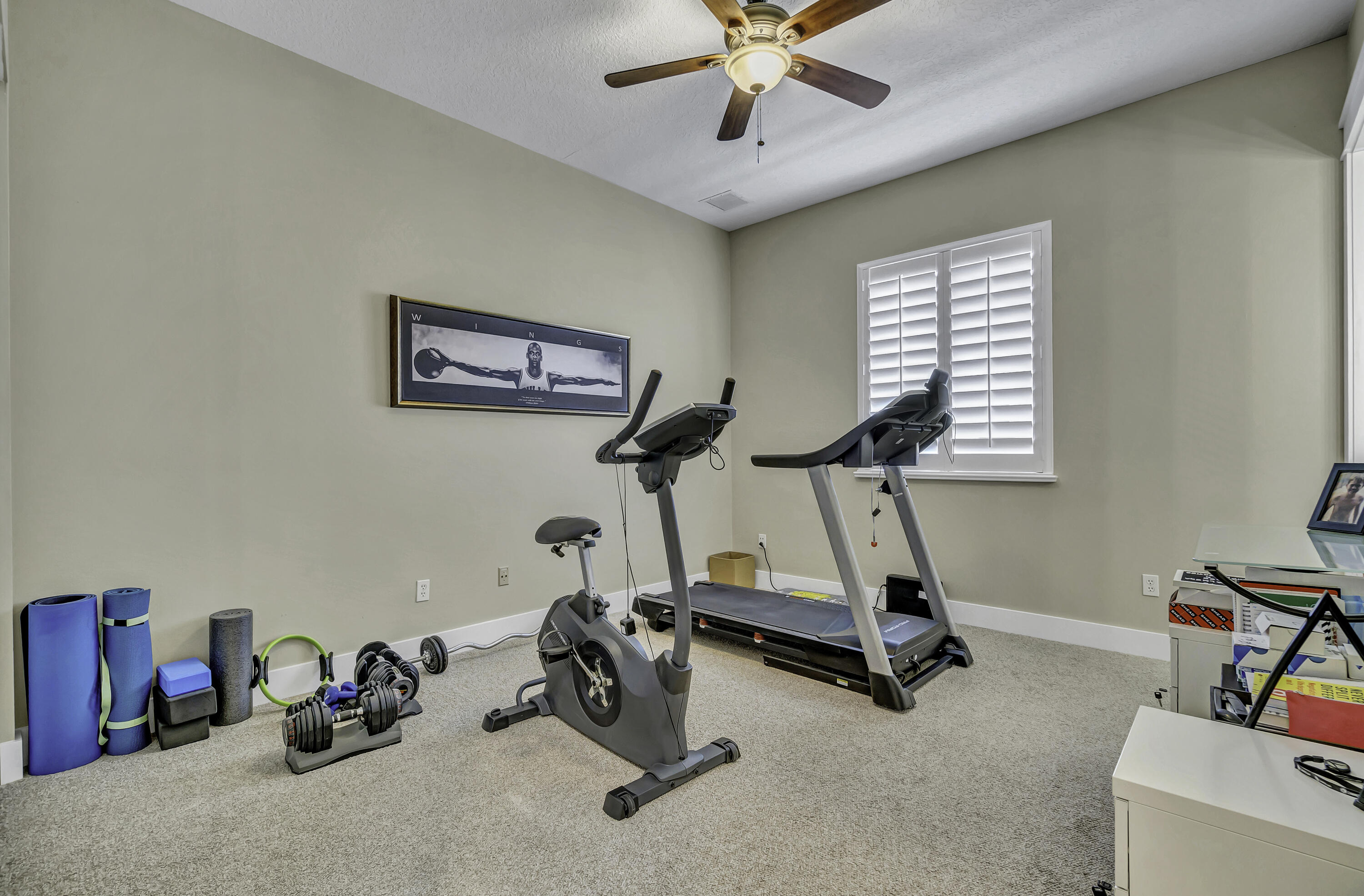 1209 Breakers W Boulevard West Palm Beach, FL 33411 - Photo 22 of 73 a view of a room with gym equipment