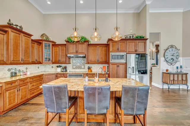 a room with lots of furniture and window