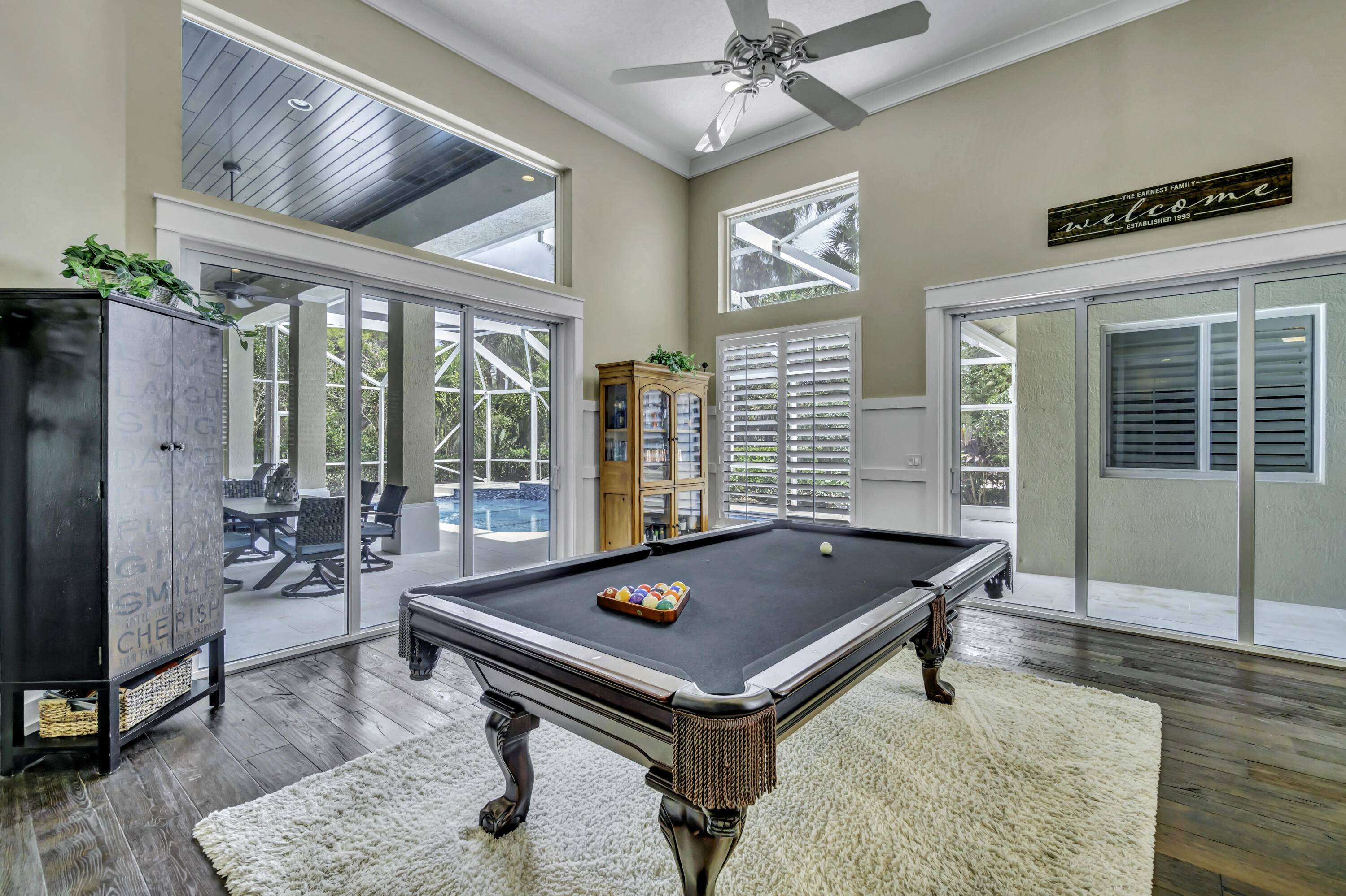 1209 Breakers W Boulevard West Palm Beach, FL 33411 - Photo 33 of 73 a room with pool table and windows