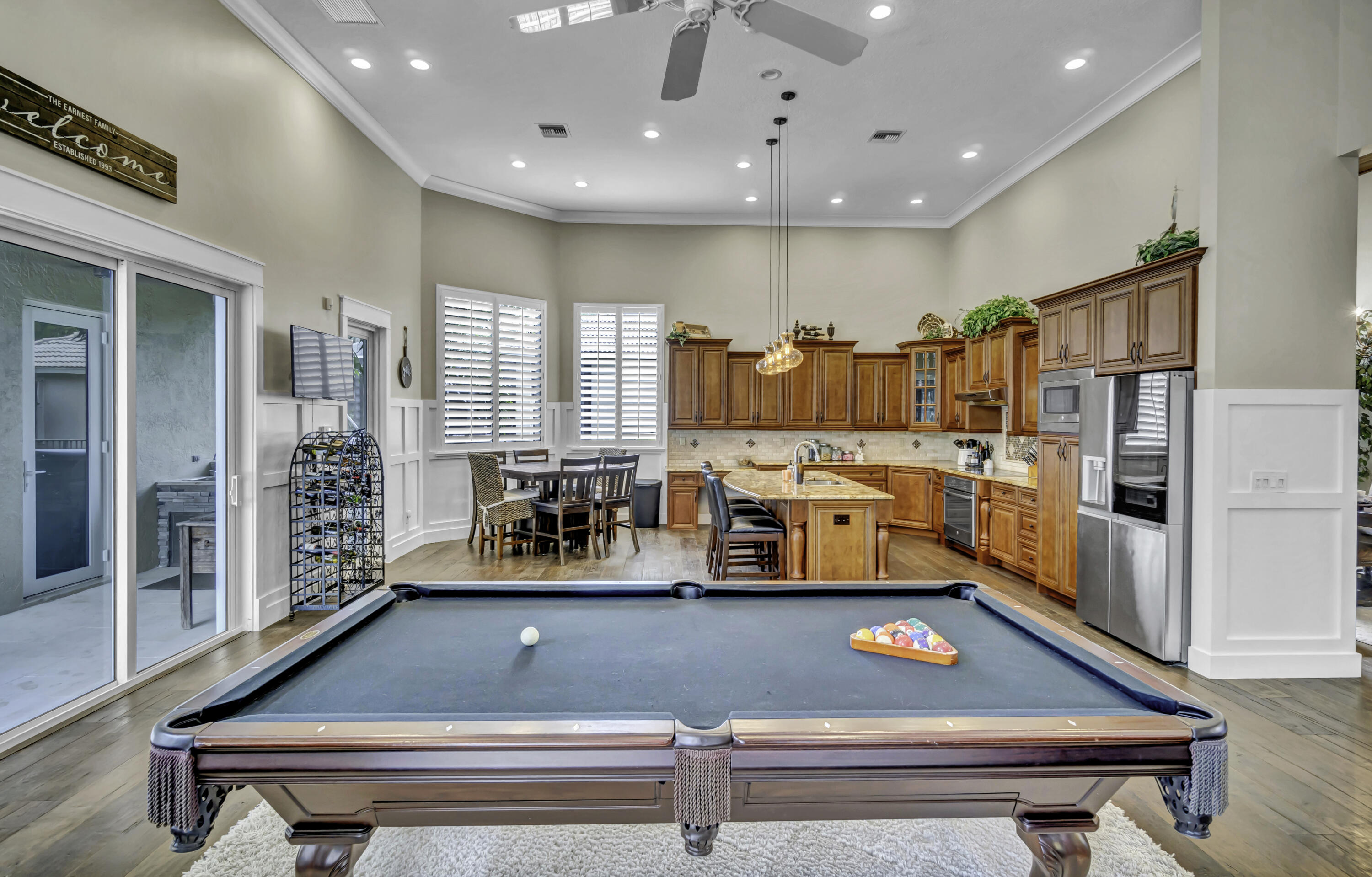 1209 Breakers W Boulevard West Palm Beach, FL 33411 - Photo 34 of 73 a room with lots of furniture and window