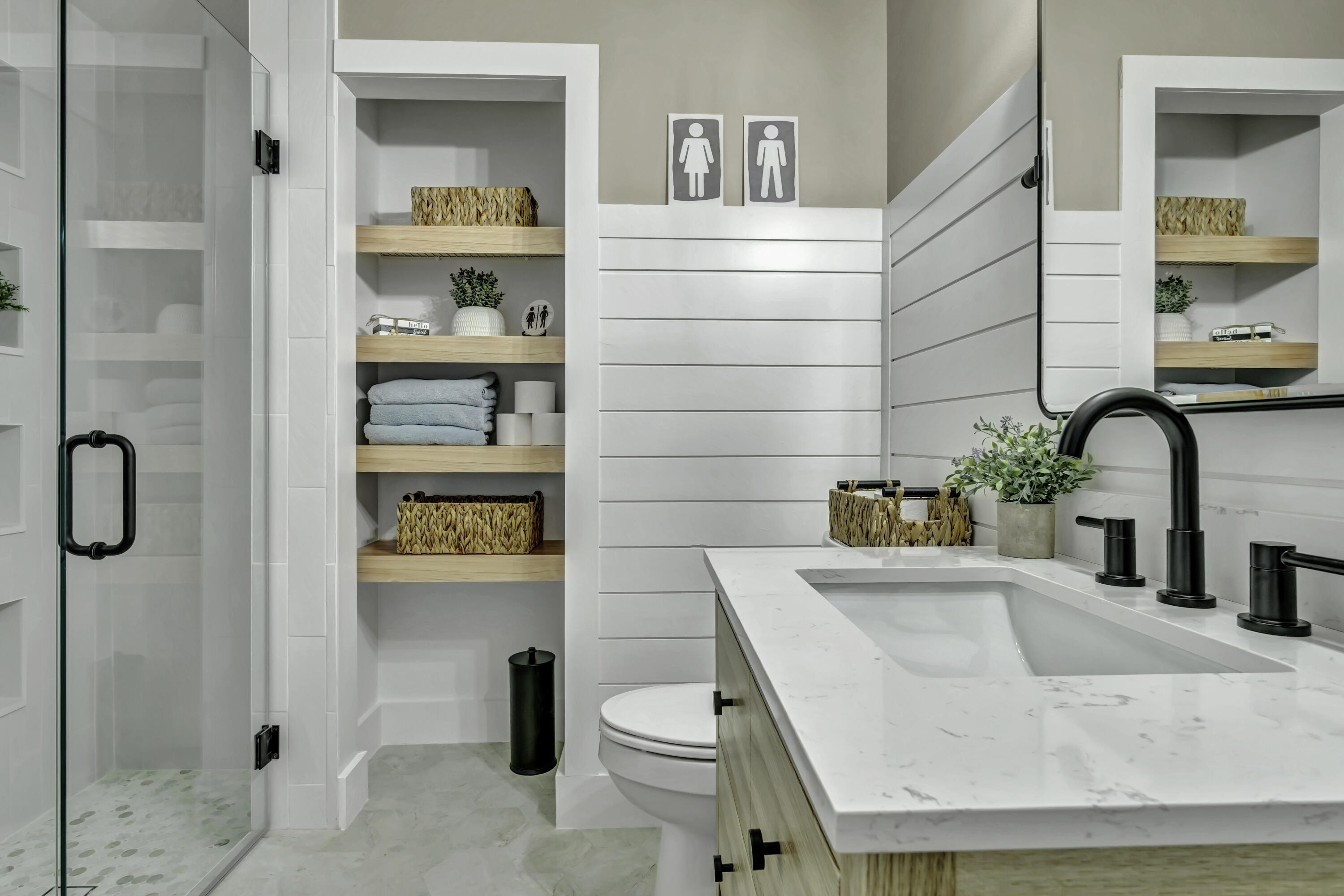 1209 Breakers W Boulevard West Palm Beach, FL 33411 - Photo 37 of 73 a bathroom with a sink a toilet and shower curtain