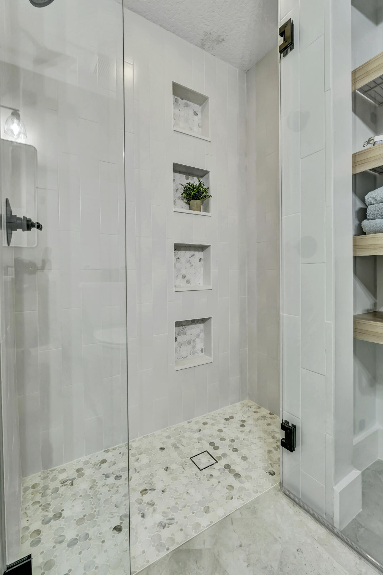 1209 Breakers W Boulevard West Palm Beach, FL 33411 - Photo 38 of 73 a bathroom with a shower