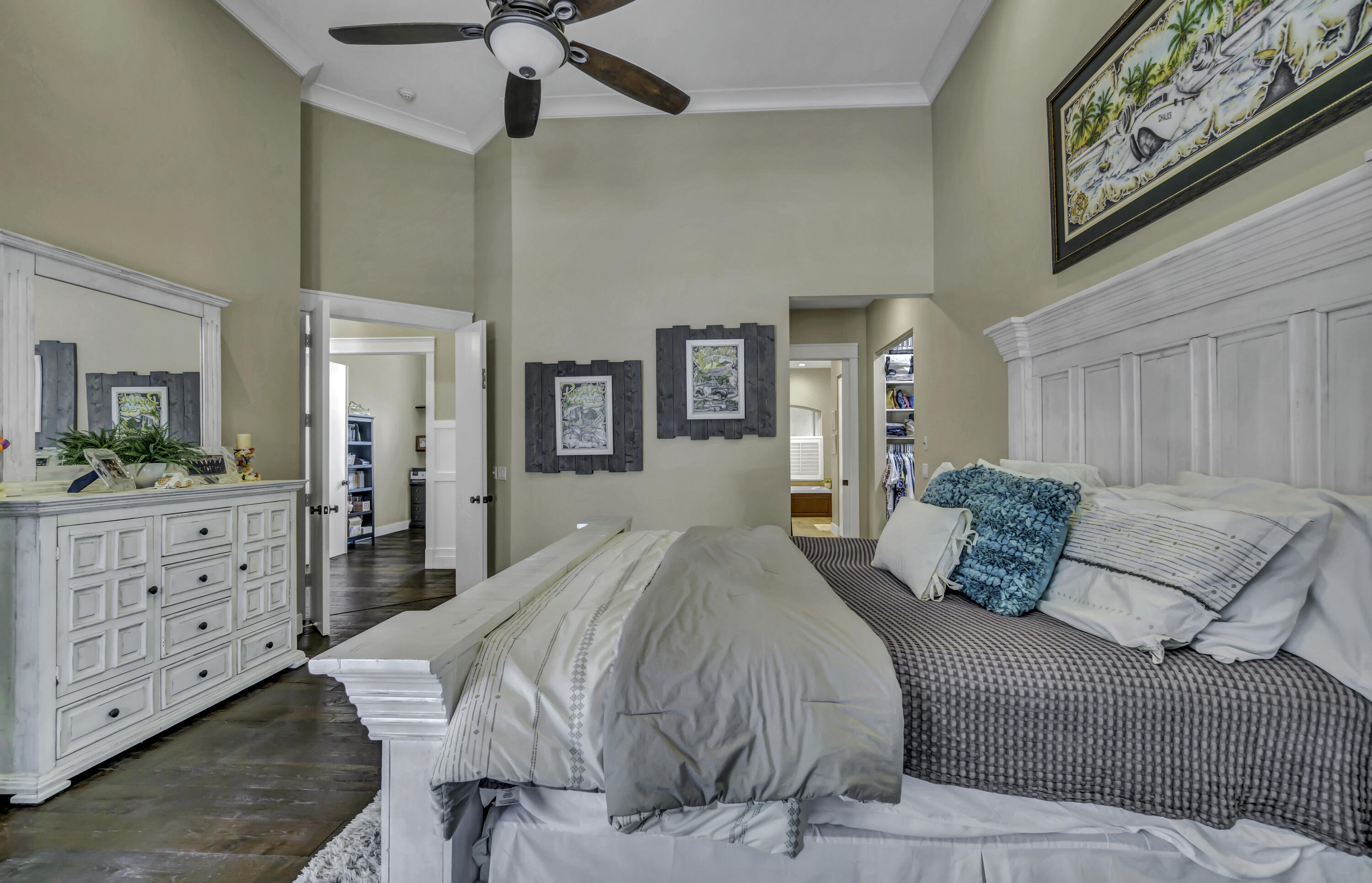 1209 Breakers W Boulevard West Palm Beach, FL 33411 - Photo 41 of 73 a bedroom with a bed and a dresser