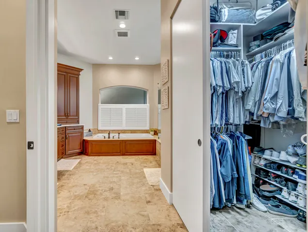 a view of a backyard with a swimming pool