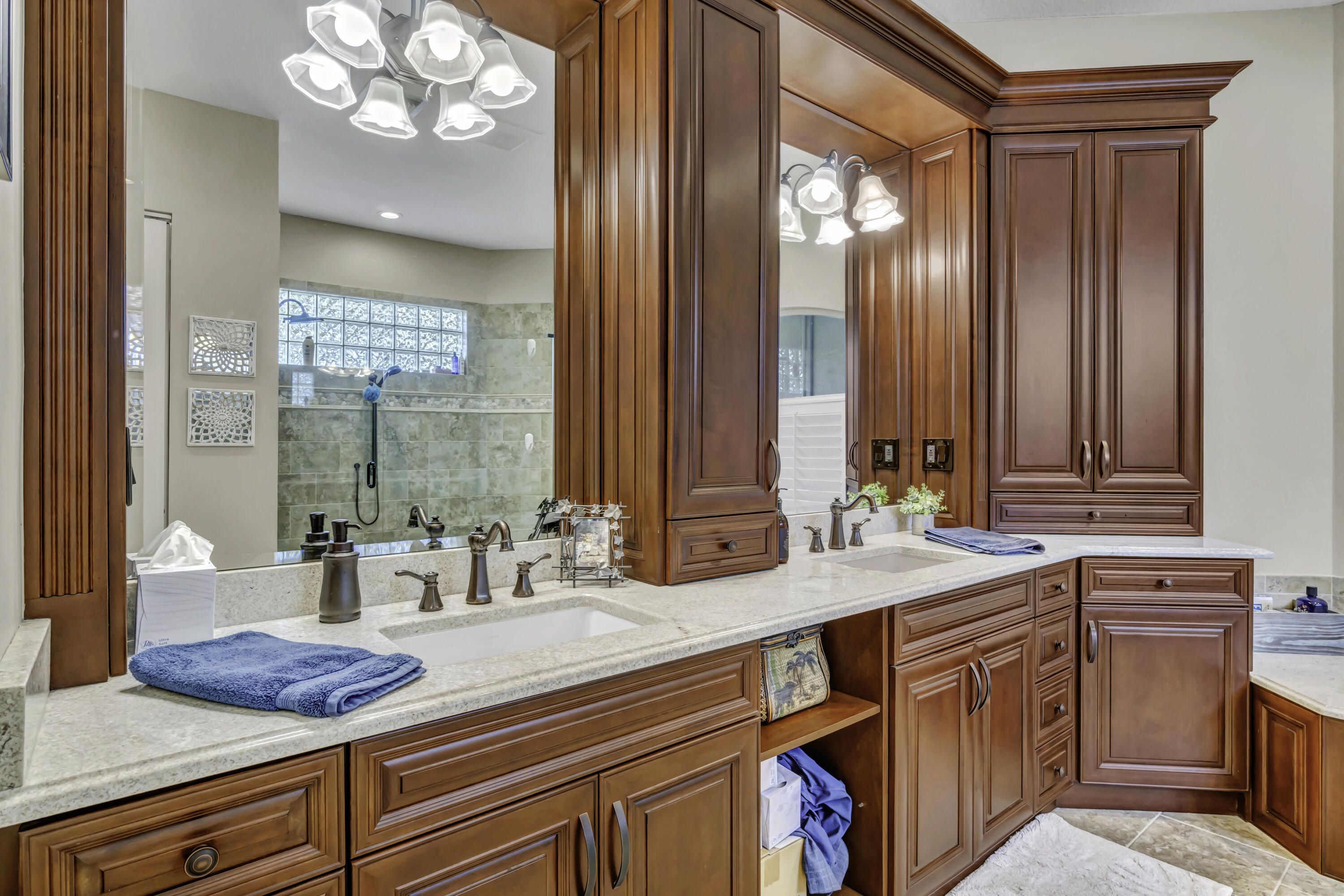 1209 Breakers W Boulevard West Palm Beach, FL 33411 - Photo 46 of 73 a kitchen with stainless steel appliances sink cabinets and window