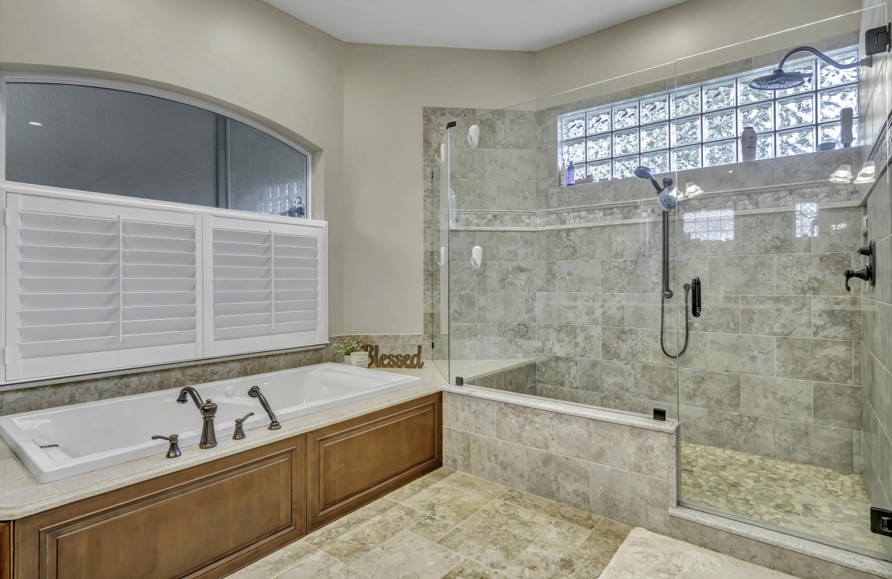 1209 Breakers W Boulevard West Palm Beach, FL 33411 - Photo 47 of 73 a bathroom with a bathtub and a shower