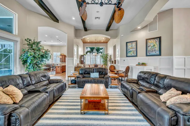 a view of a house with a yard and plants