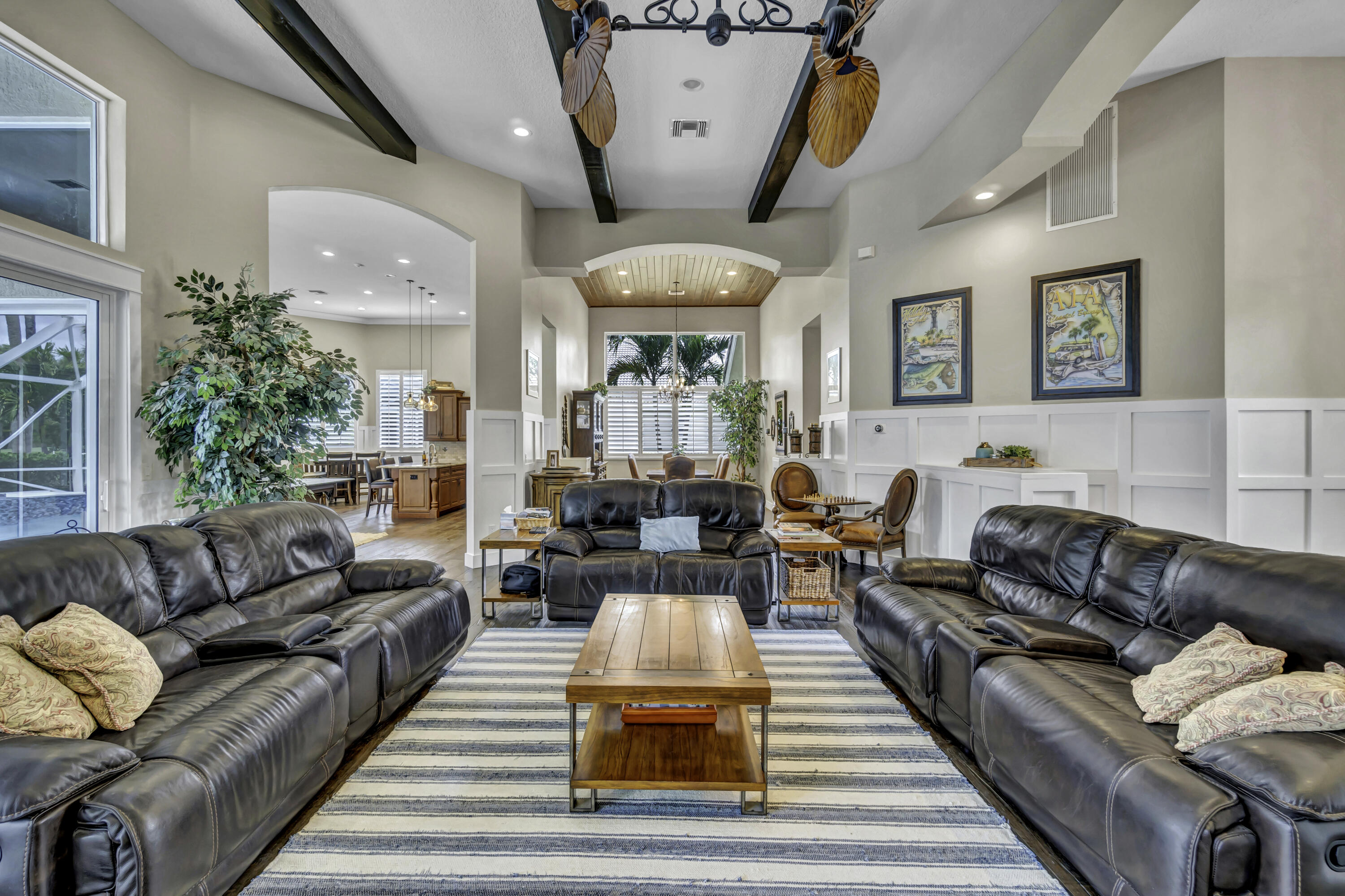 1209 Breakers W Boulevard West Palm Beach, FL 33411 - Photo 49 of 73 a living room with furniture and a large window