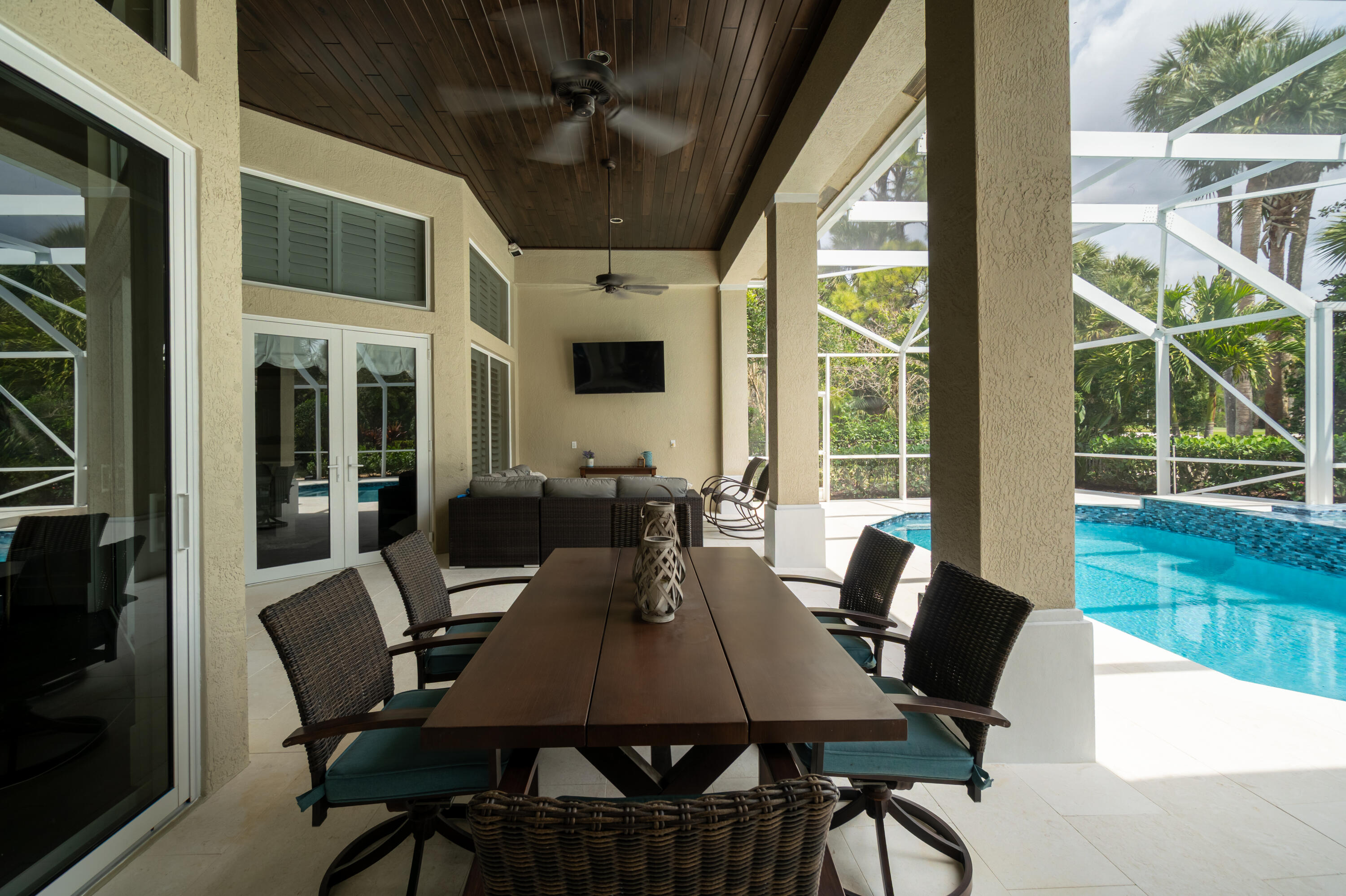 1209 Breakers W Boulevard West Palm Beach, FL 33411 - Photo 60 of 73 a view of a dining room with furniture window and outside view