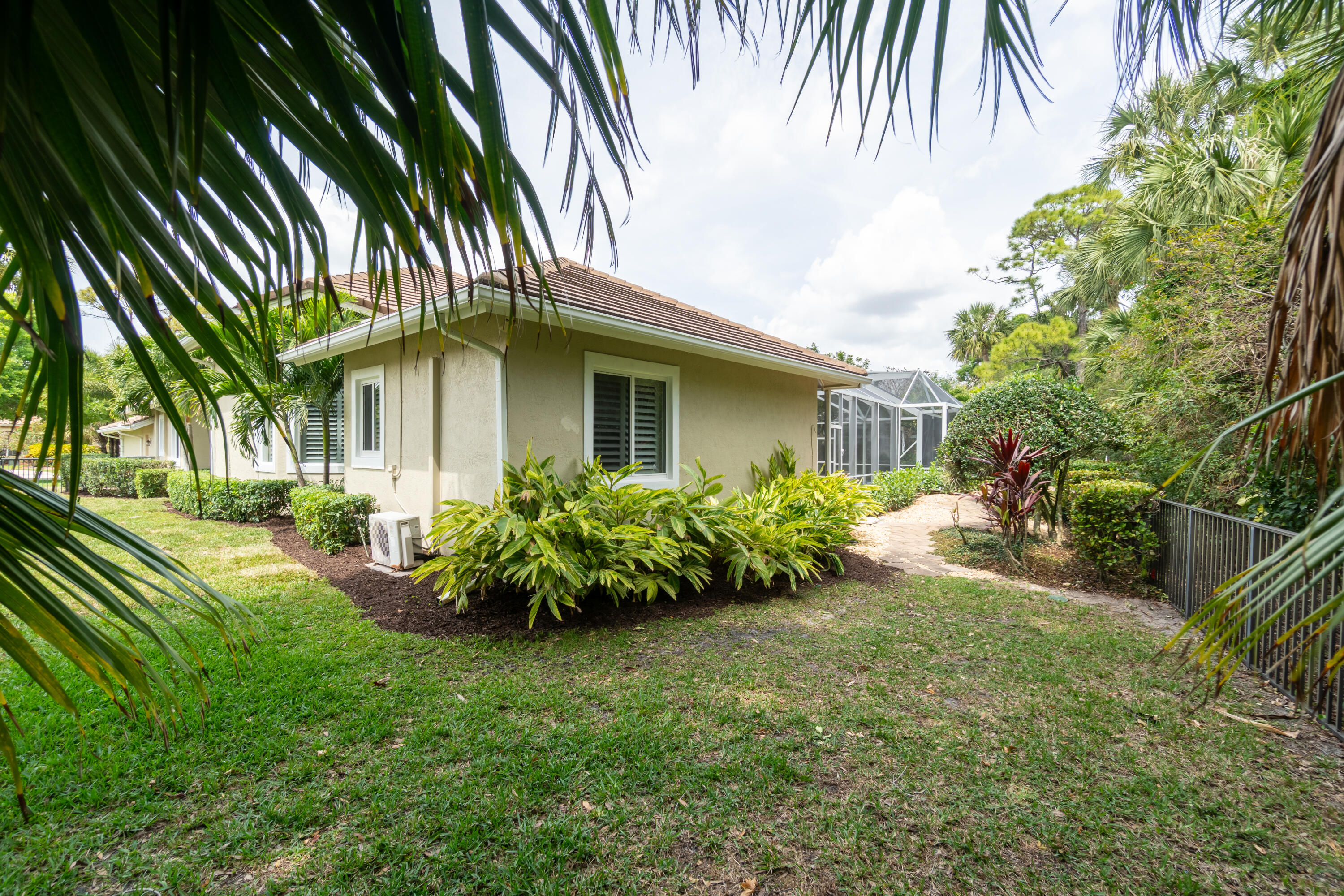 1209 Breakers W Boulevard West Palm Beach, FL 33411 - Photo 68 of 73 a view of a house with a yard and plants