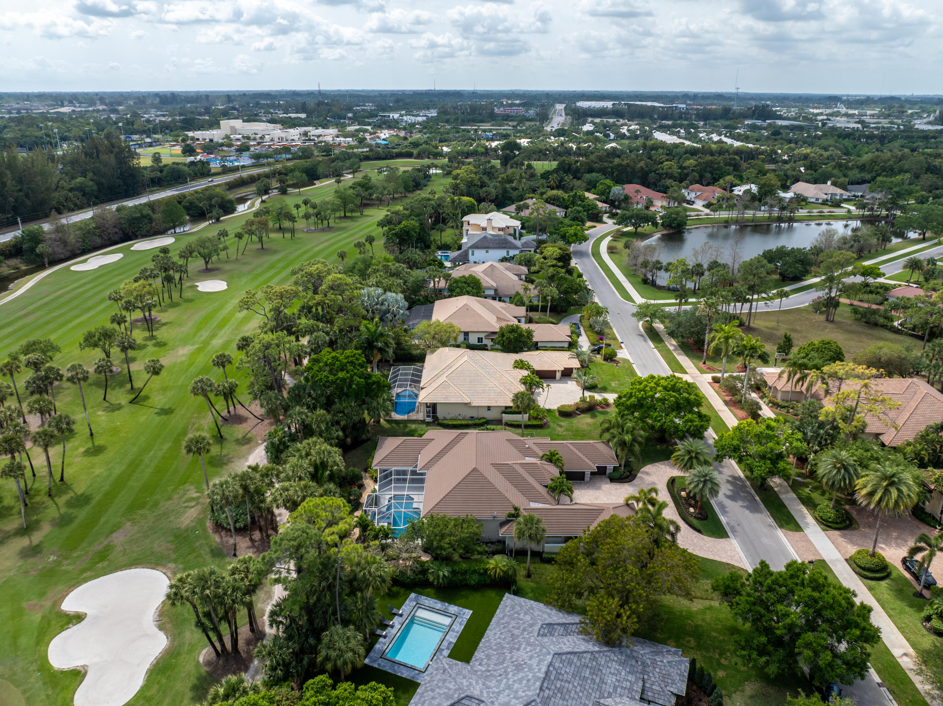 1209 Breakers W Boulevard West Palm Beach, FL 33411 - Photo 7 of 73 an aerial view of residential houses with outdoor space and river