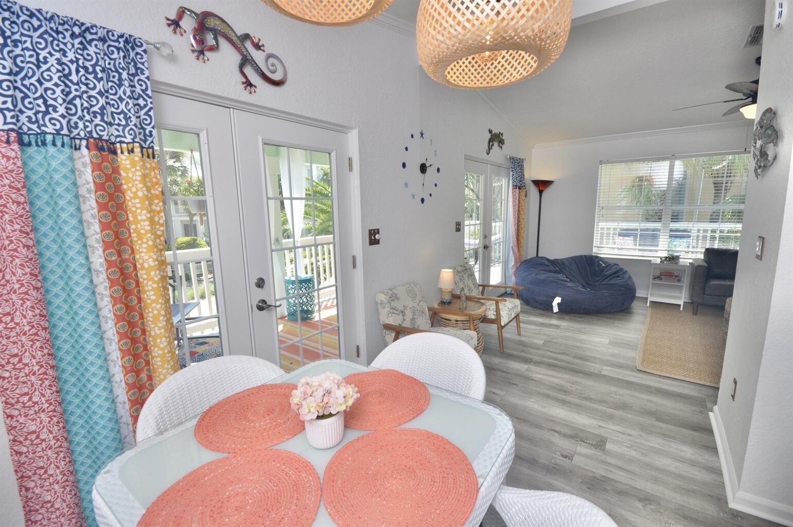 58 Los Angeles Street Miramar Beach, FL 32550 - Photo 20 of 36 a living room with furniture and a large window