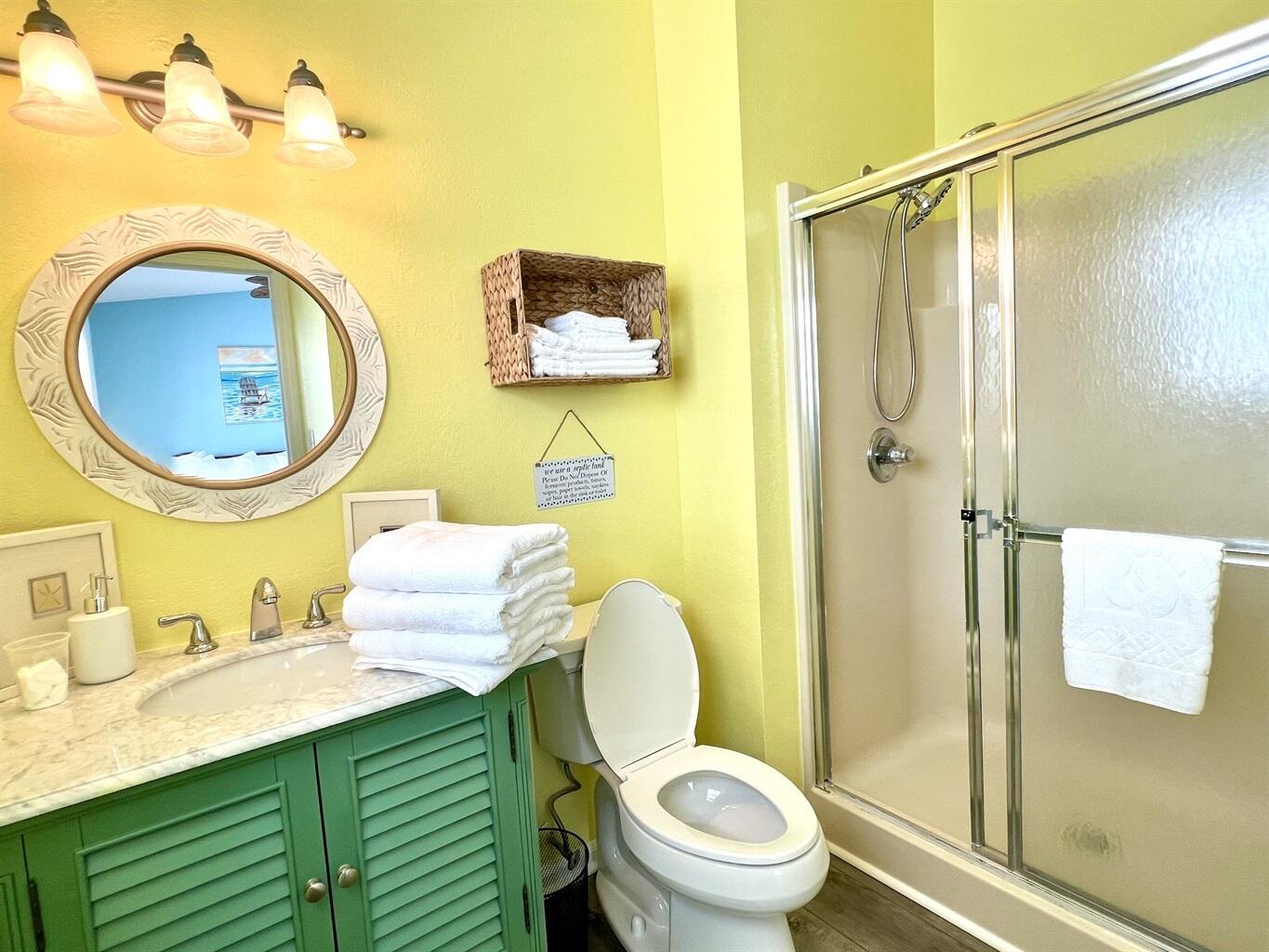 58 Los Angeles Street Miramar Beach, FL 32550 - Photo 27 of 36 a bathroom with a sink mirror vanity and toilet