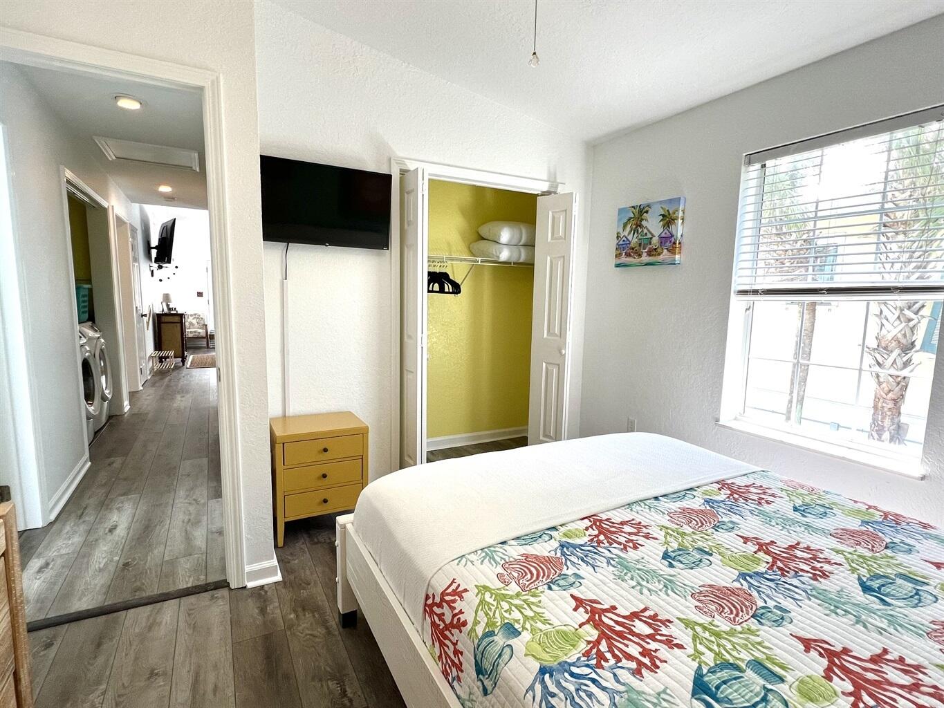 58 Los Angeles Street Miramar Beach, FL 32550 - Photo 28 of 36 a bedroom with a bed and a flat screen tv