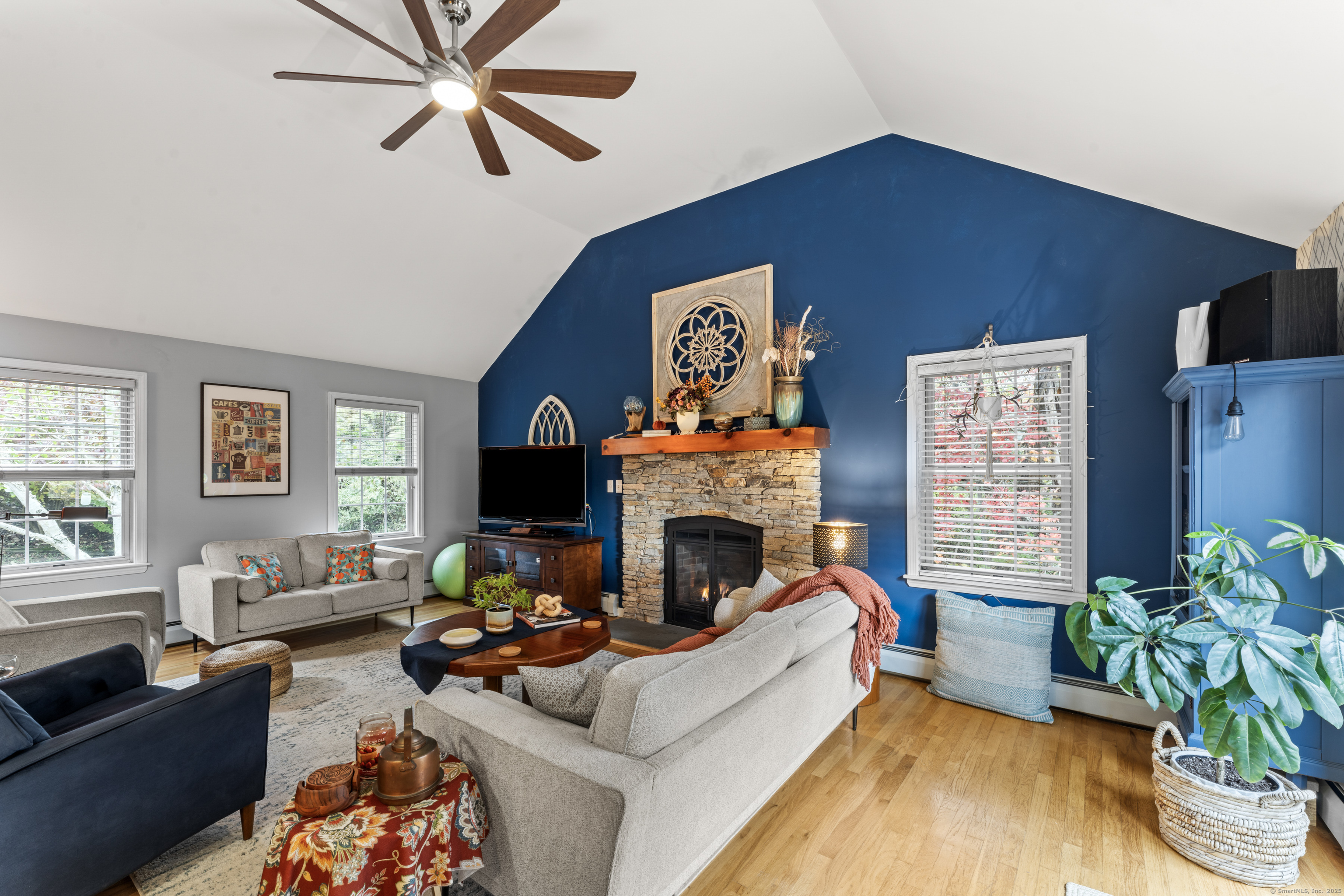 22 Lincoln Road Newtown, CT 06470 - Photo 11 of 36 a living room with furniture fireplace and a window