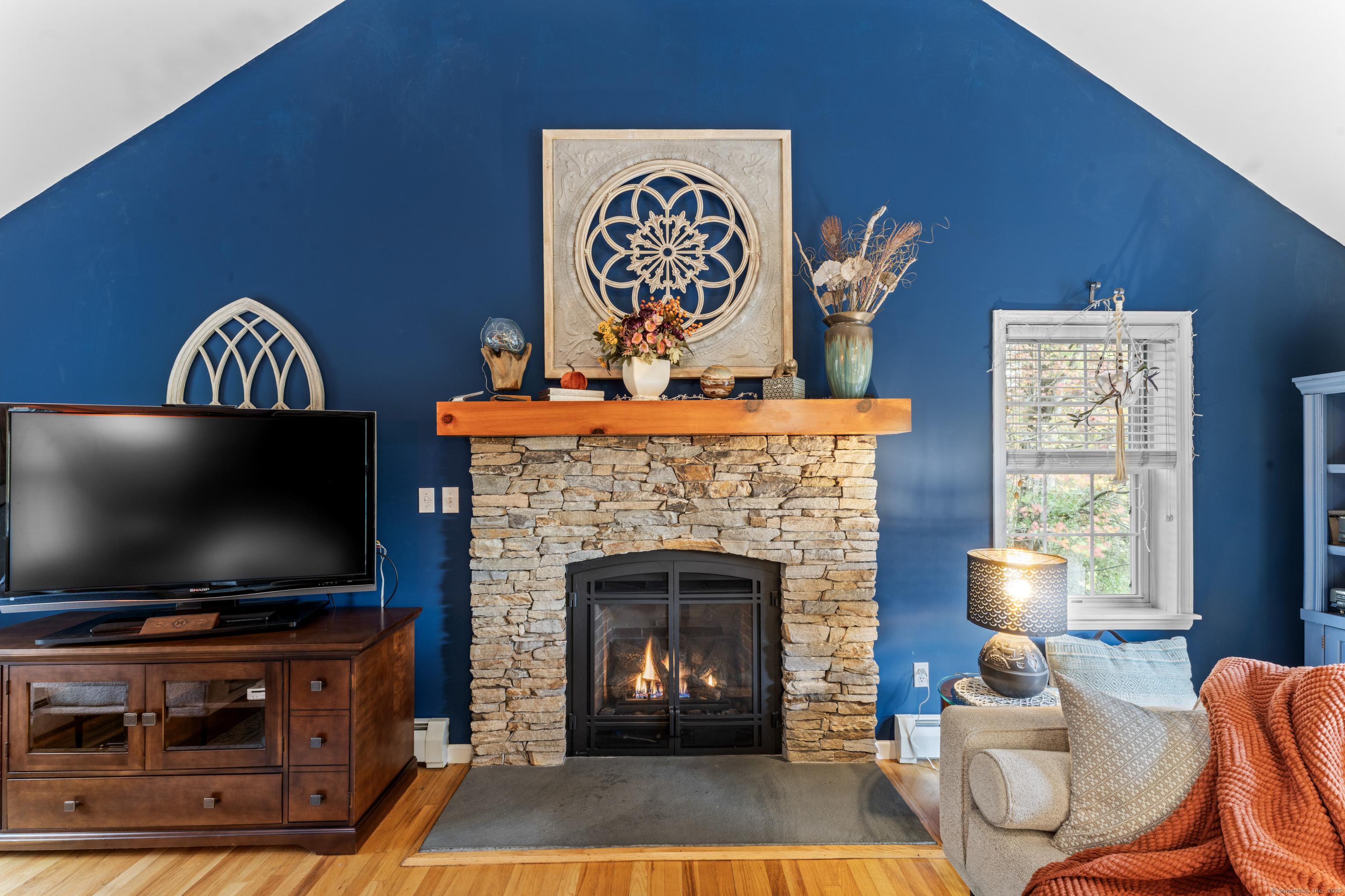 22 Lincoln Road Newtown, CT 06470 - Photo 12 of 36 a living room with furniture and a flat screen tv