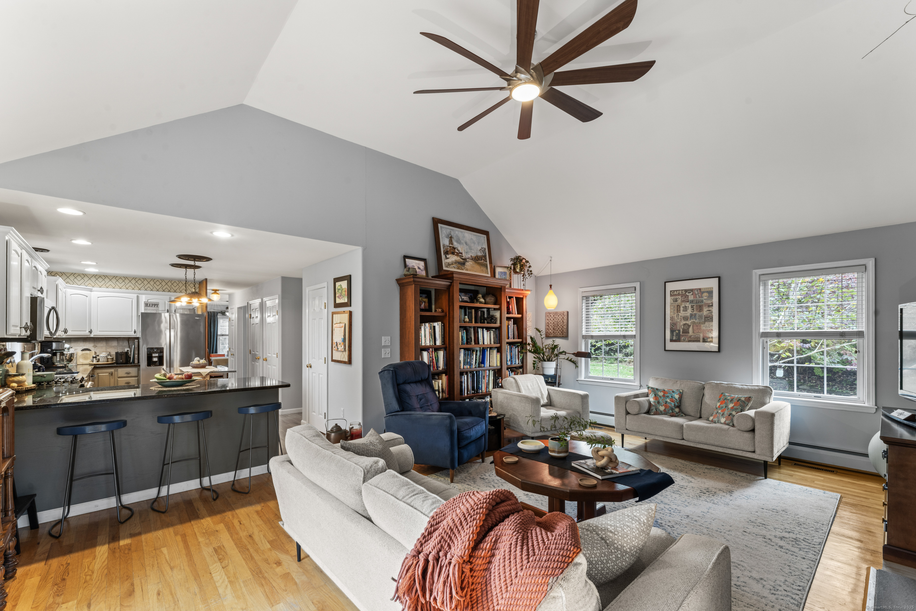 22 Lincoln Road Newtown, CT 06470 - Photo 13 of 36 a living room with furniture kitchen view and a large window