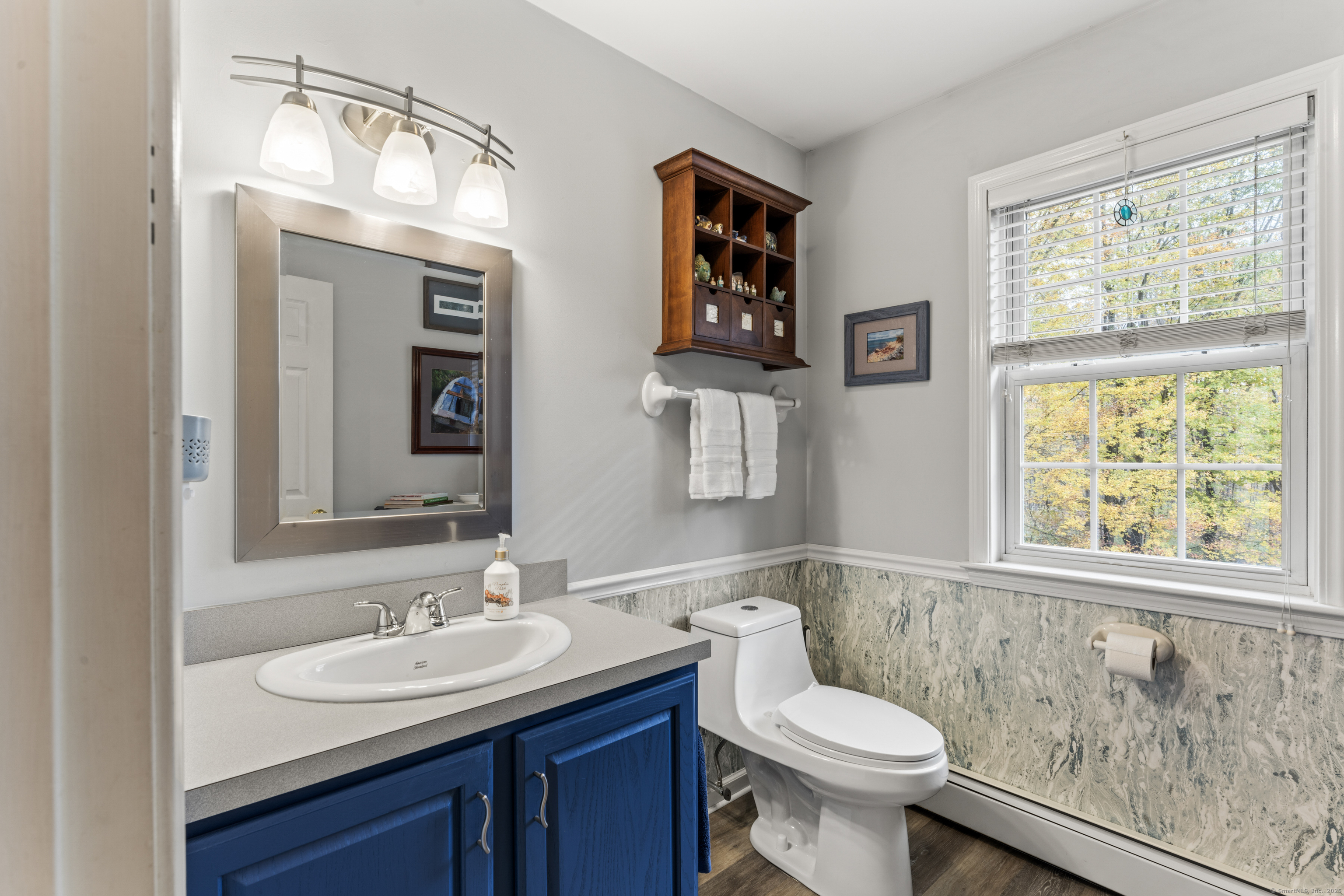 22 Lincoln Road Newtown, CT 06470 - Photo 16 of 36 a bathroom with a toilet sink and mirror