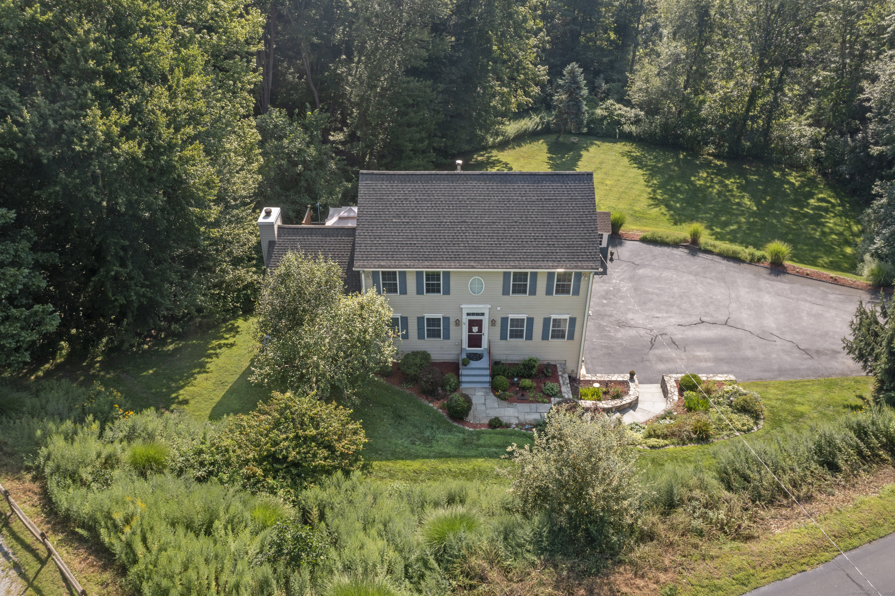 22 Lincoln Road Newtown, CT 06470 - Photo 2 of 36 a aerial view of a house with swimming pool next to a yard