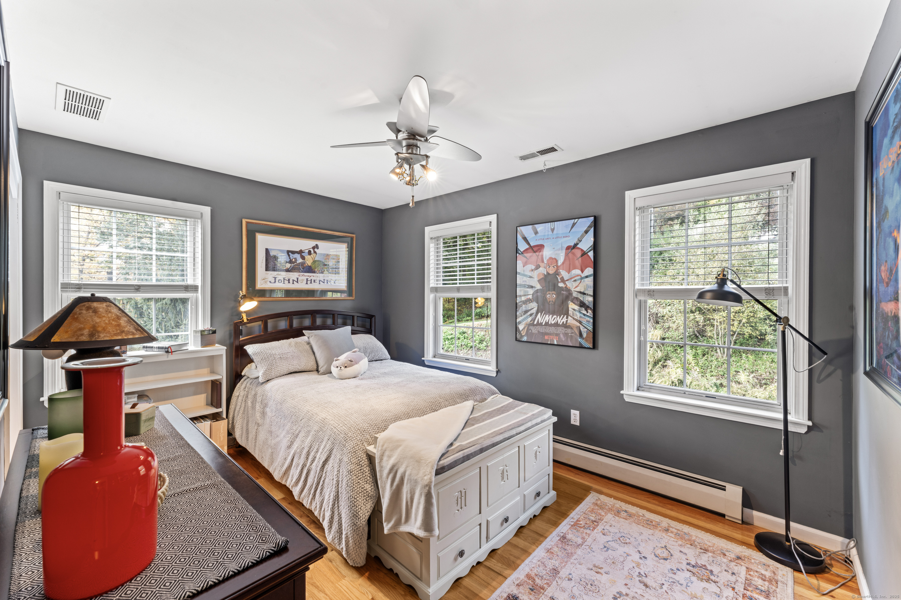 22 Lincoln Road Newtown, CT 06470 - Photo 24 of 36 a bedroom with a bed and dresser with mirror