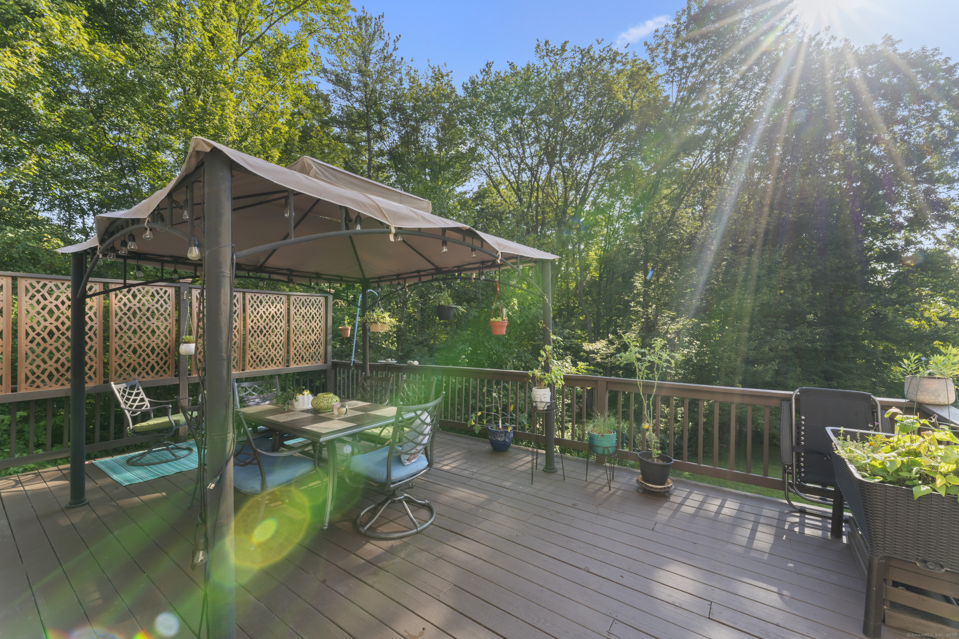 22 Lincoln Road Newtown, CT 06470 - Photo 27 of 36 a view of deck with chairs and wooden floor
