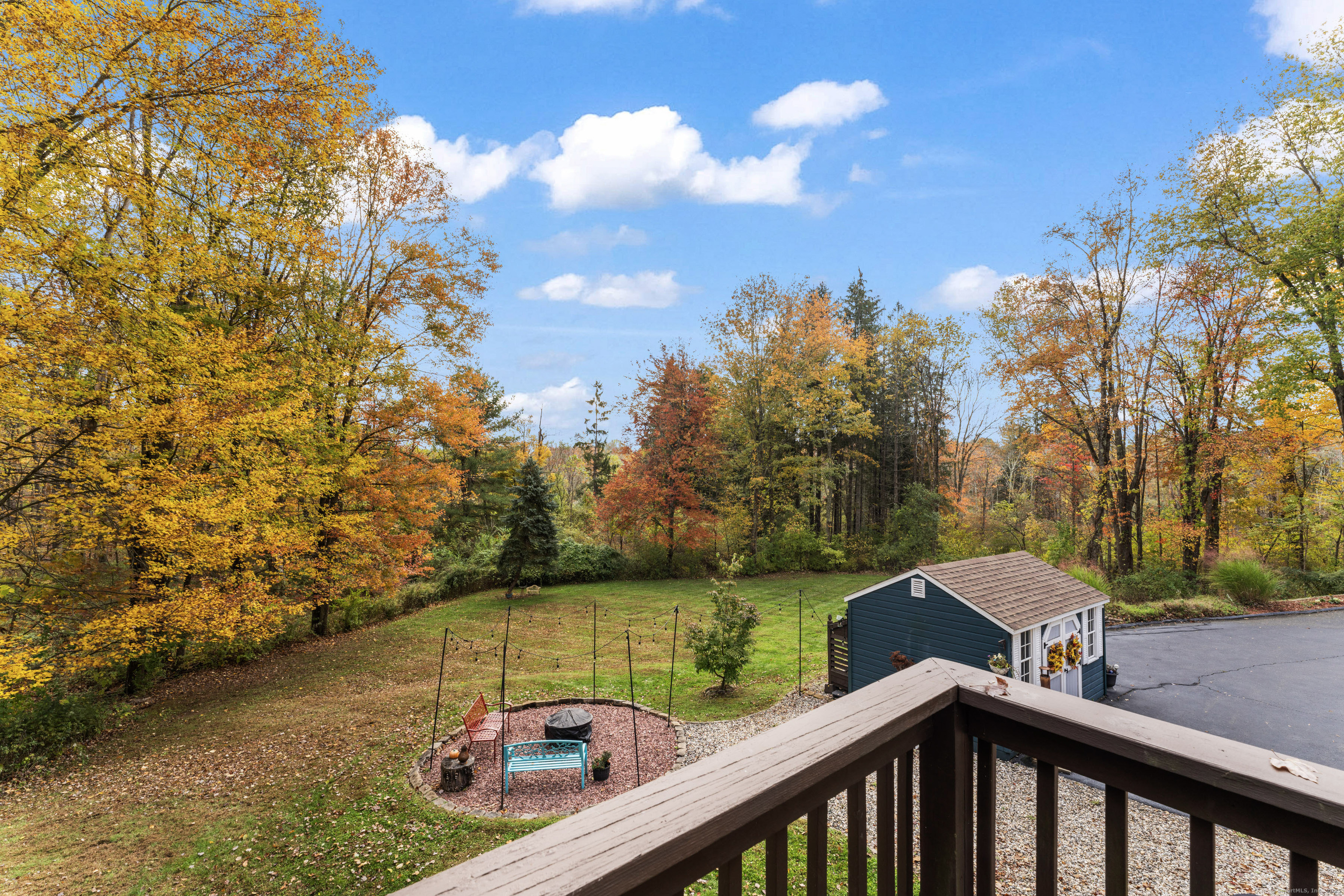 22 Lincoln Road Newtown, CT 06470 - Photo 30 of 36 a view of a lake with a house in the background