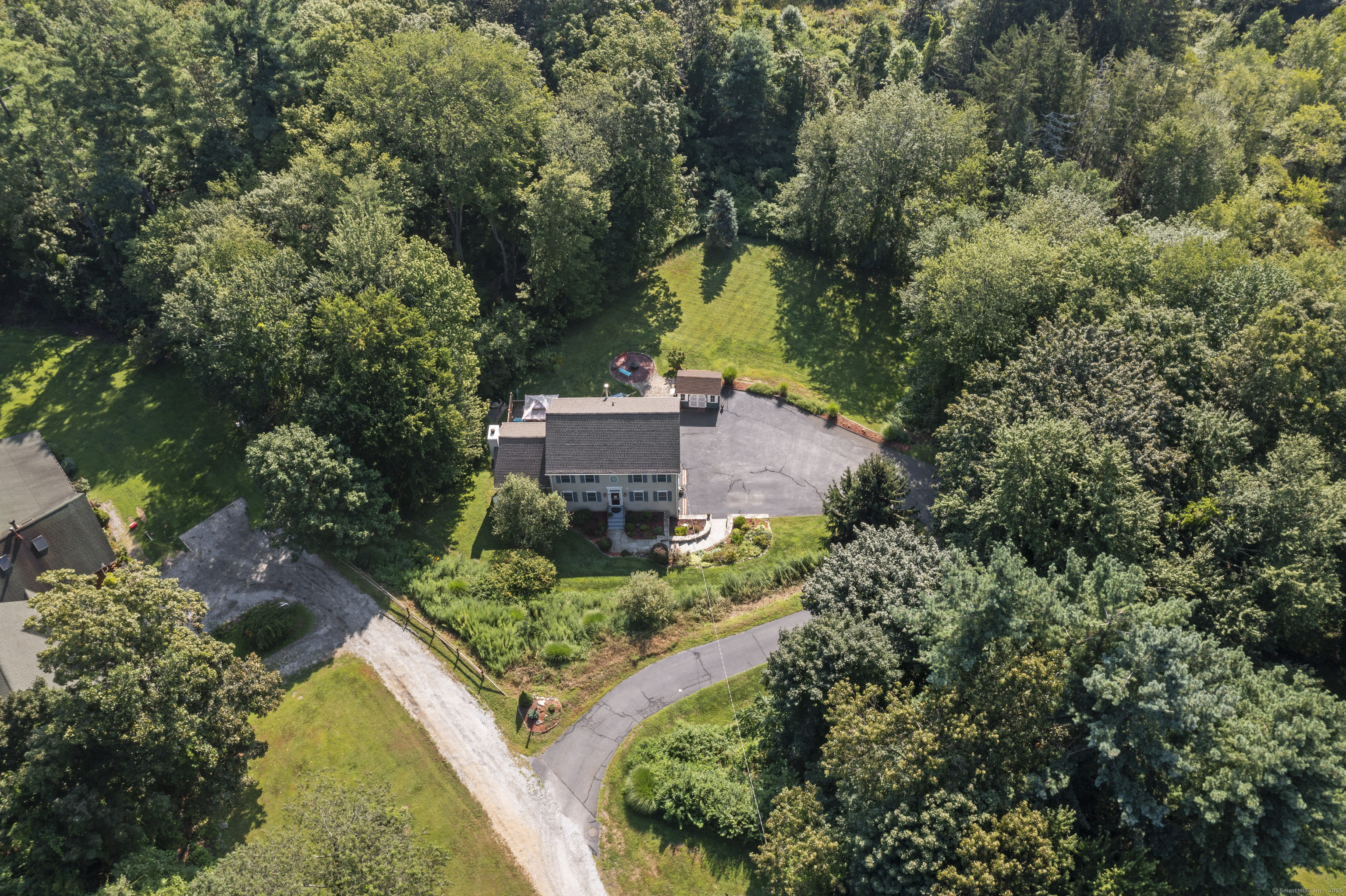 22 Lincoln Road Newtown, CT 06470 - Photo 31 of 36 an aerial view of a house with a yard