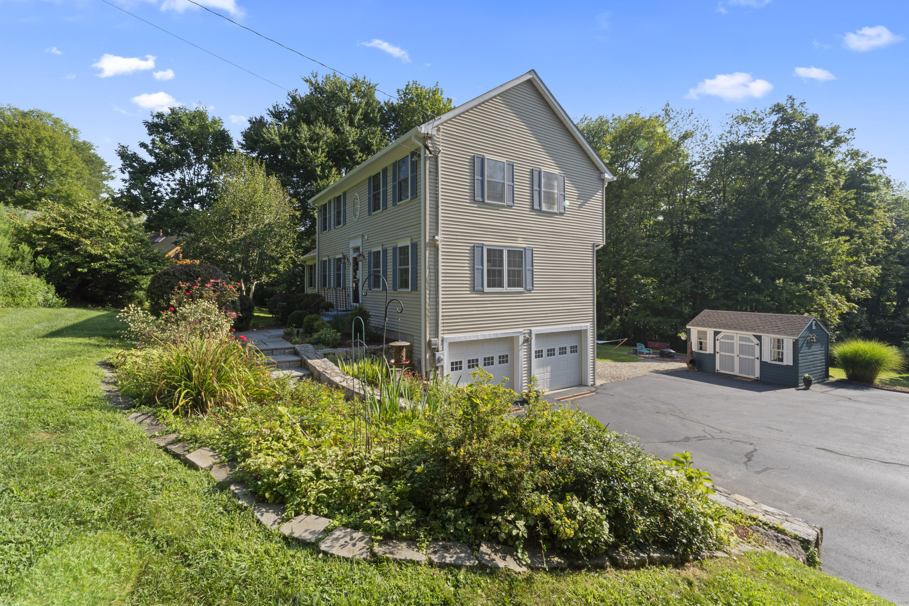 22 Lincoln Road Newtown, CT 06470 - Photo 4 of 36 a house view with a outdoor space