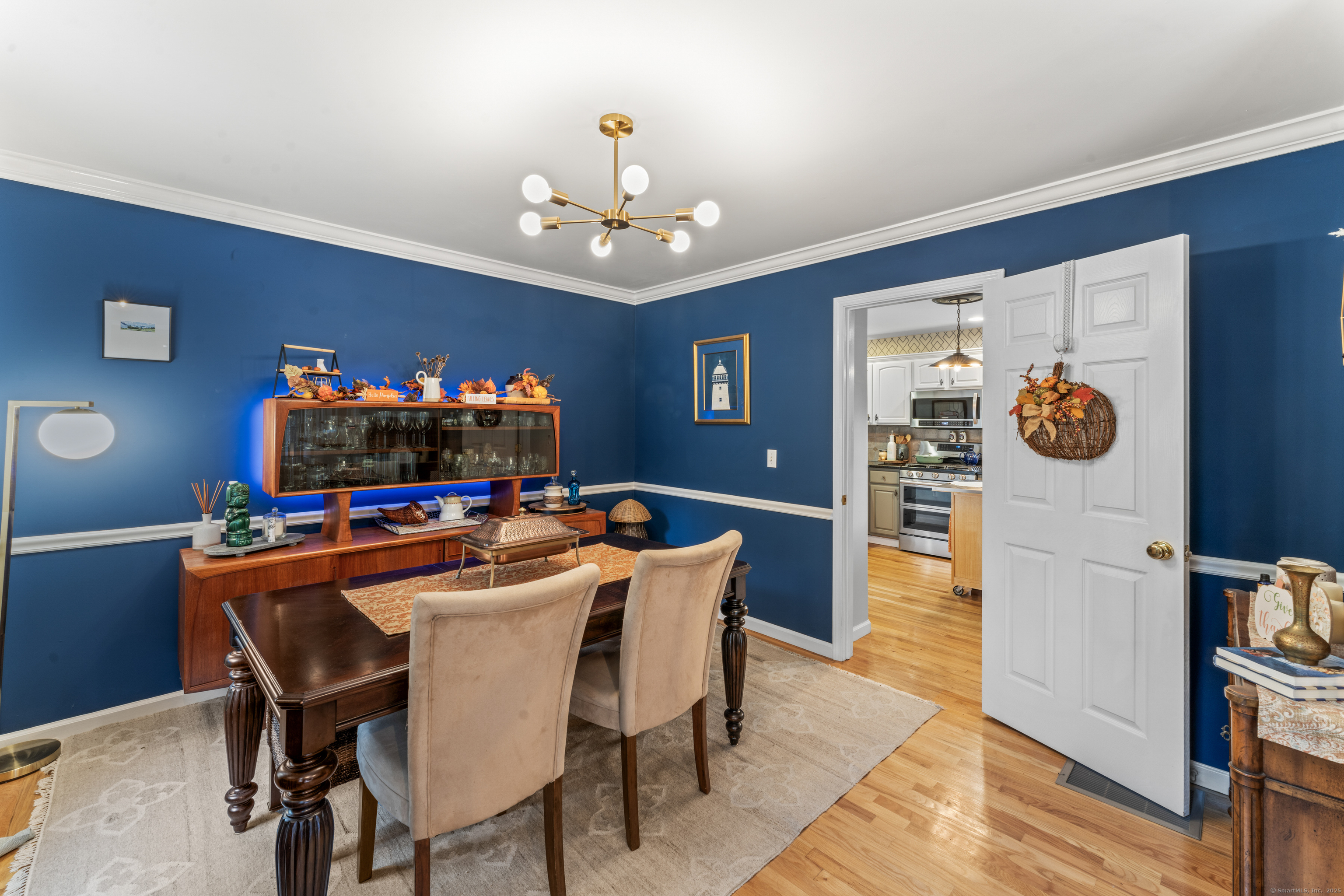 22 Lincoln Road Newtown, CT 06470 - Photo 8 of 36 a view of a dining room with furniture and wooden floor