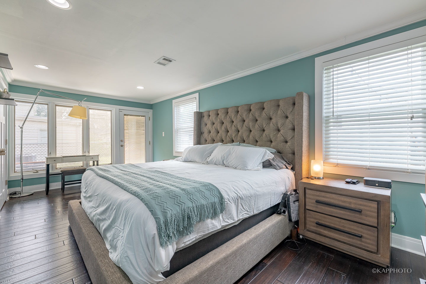 2124 Seward Street Evanston, IL 60202 - Photo 15 of 27 a bedroom with a bed and large windows