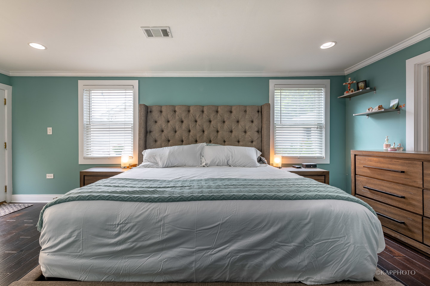 2124 Seward Street Evanston, IL 60202 - Photo 16 of 27 a bedroom with a bed and a dresser
